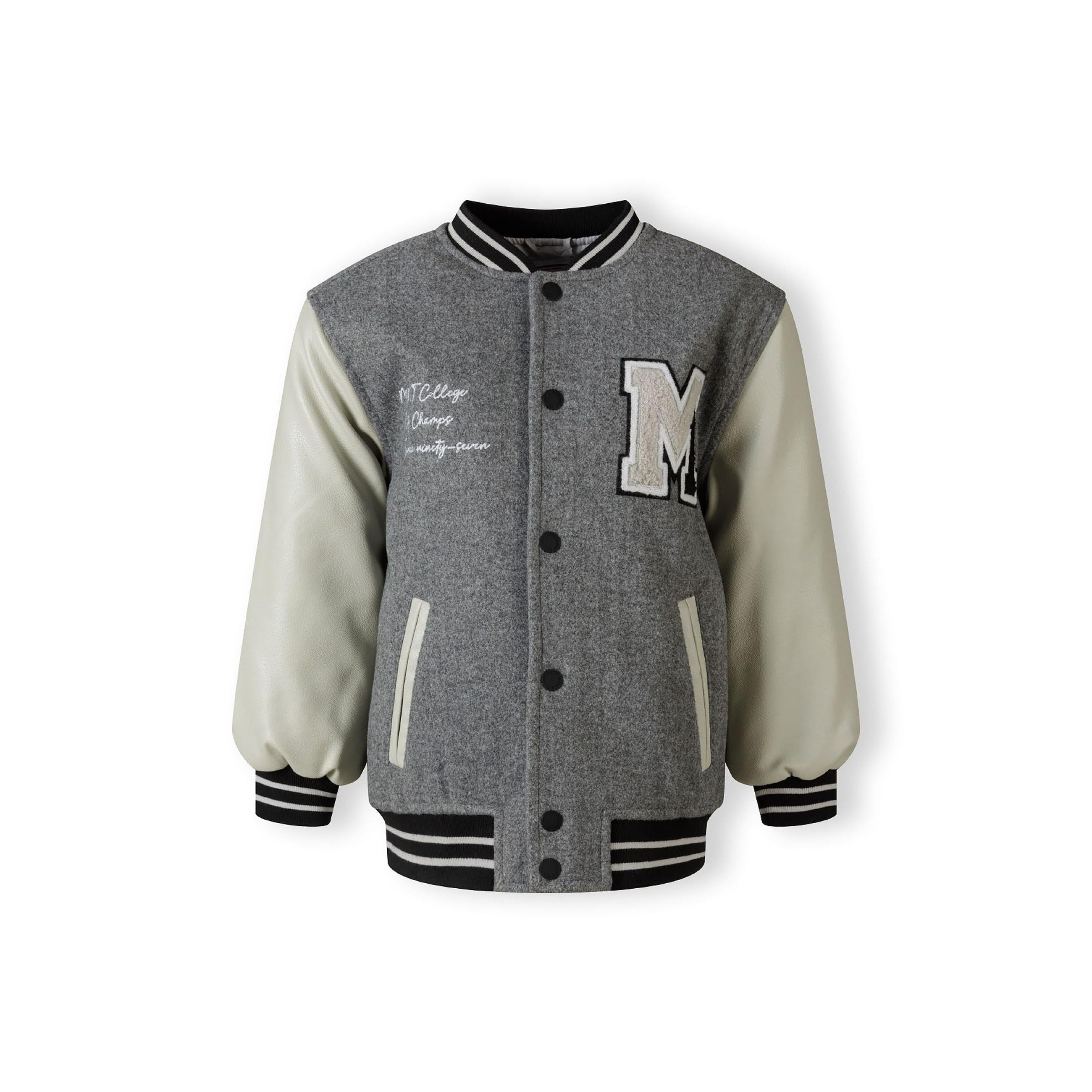 Back view of grey varsity jacket with cream PU sleeves and ribbed trim details on white background