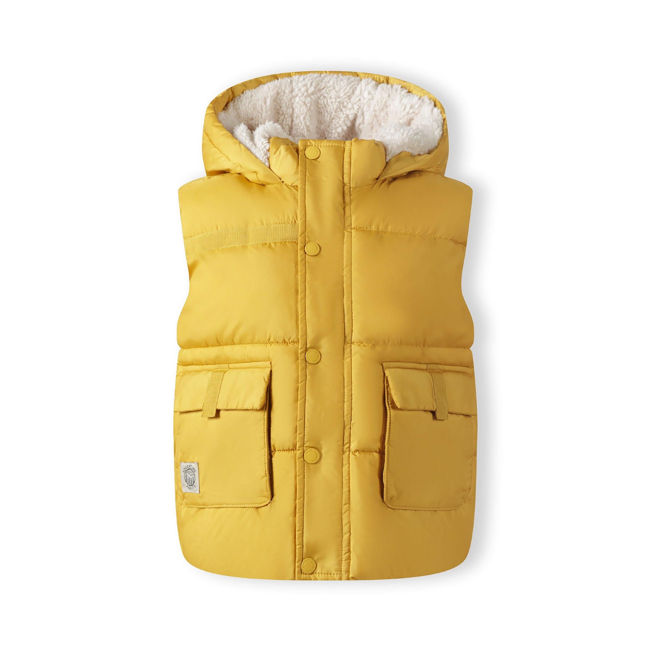 Back view of mustard yellow quilted gilet showing padded construction and hood detail on white background