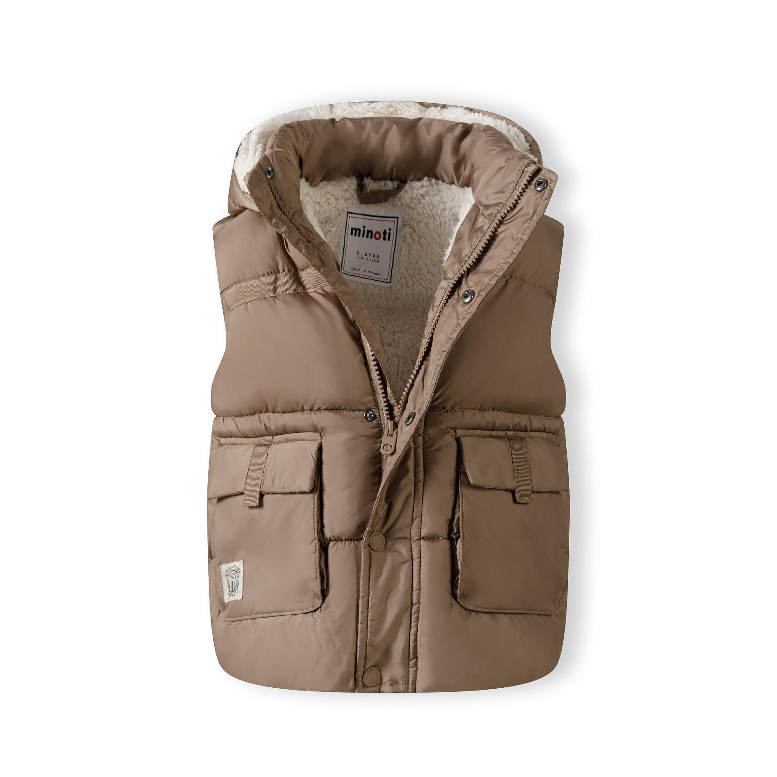 Flat lay of beige quilted hooded gilet showing teddy fleece lining, zip closure and patch pockets on white background
