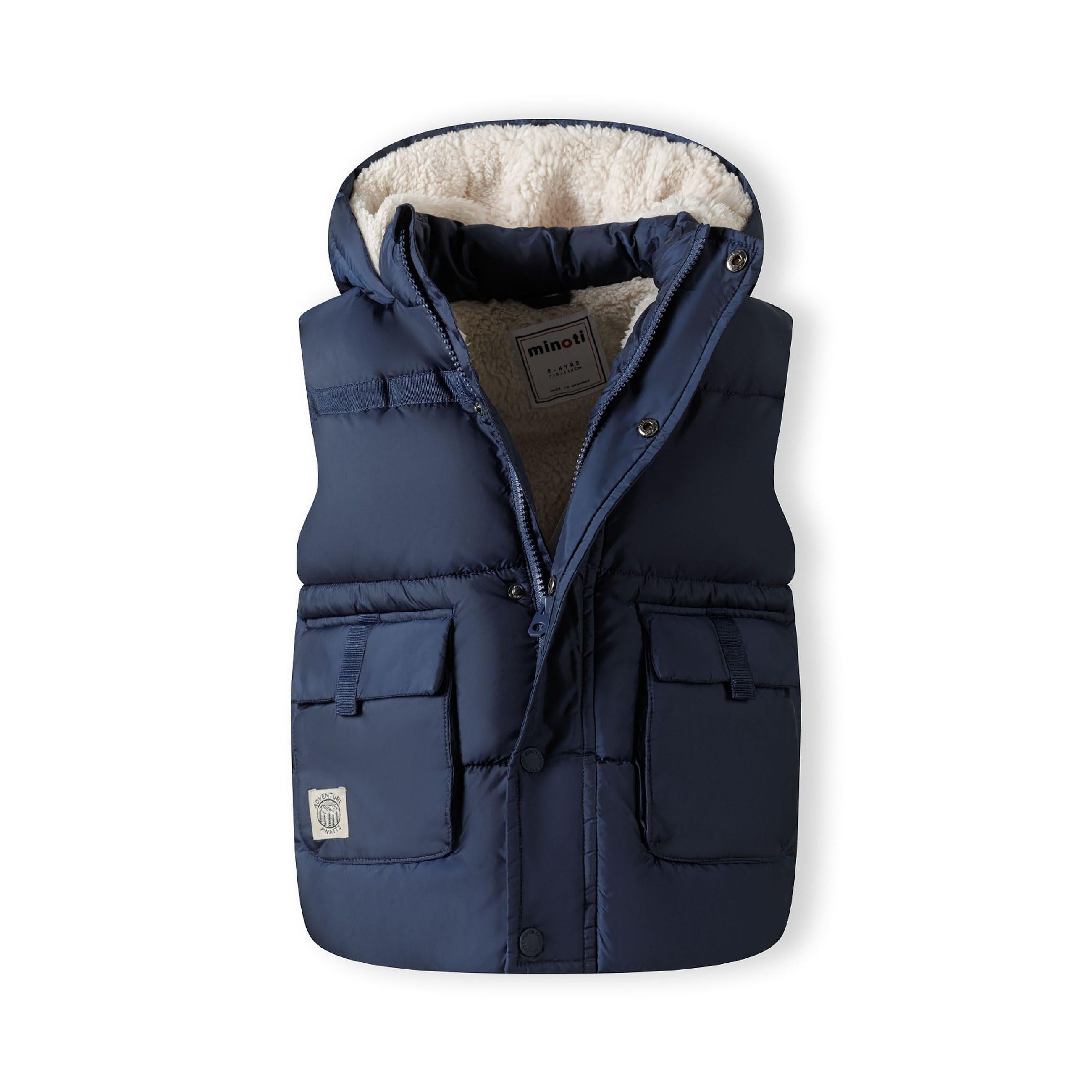 Navy gilet laid flat showing zip fastening, patch pockets, teddy fleece lining and hood detail on white background