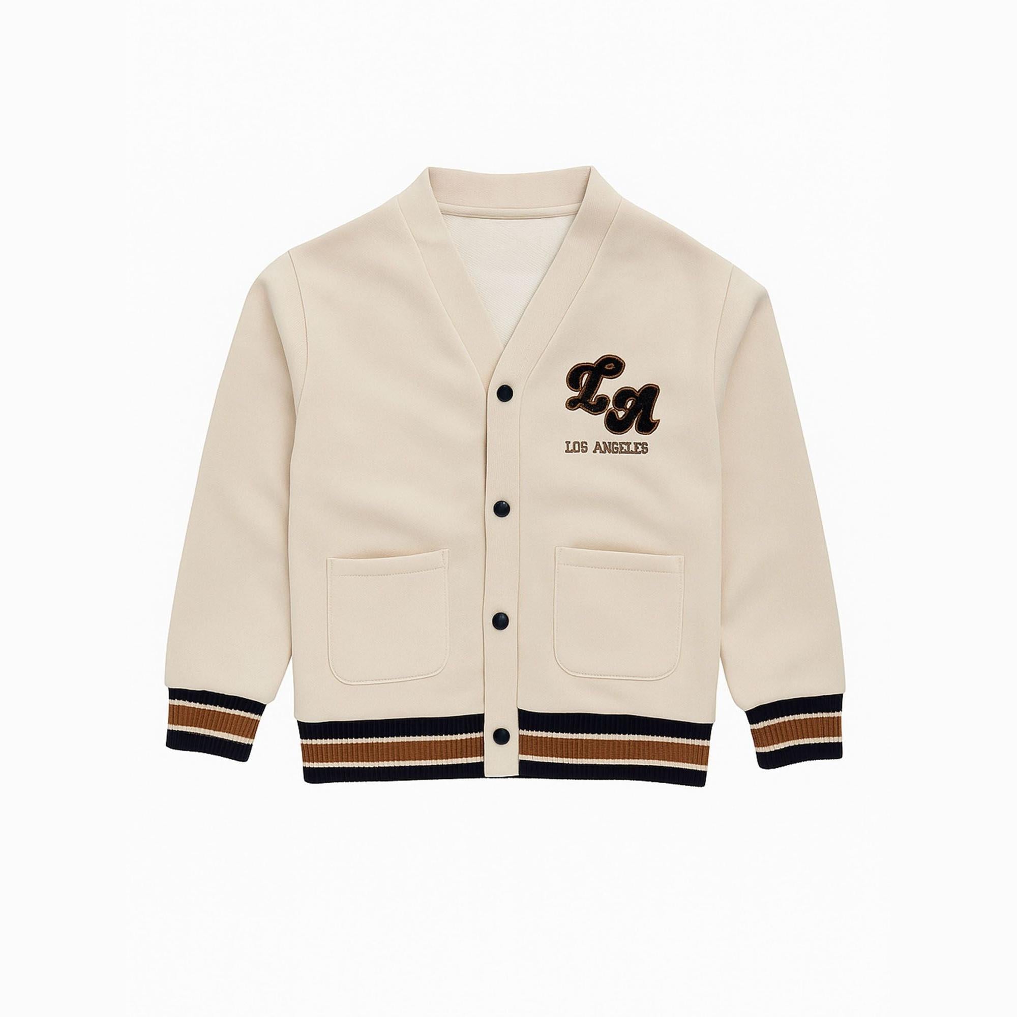 Back view of cream cardigan showing clean design with varsity-inspired ribbed hem and cuff details in navy, white and rust stripes