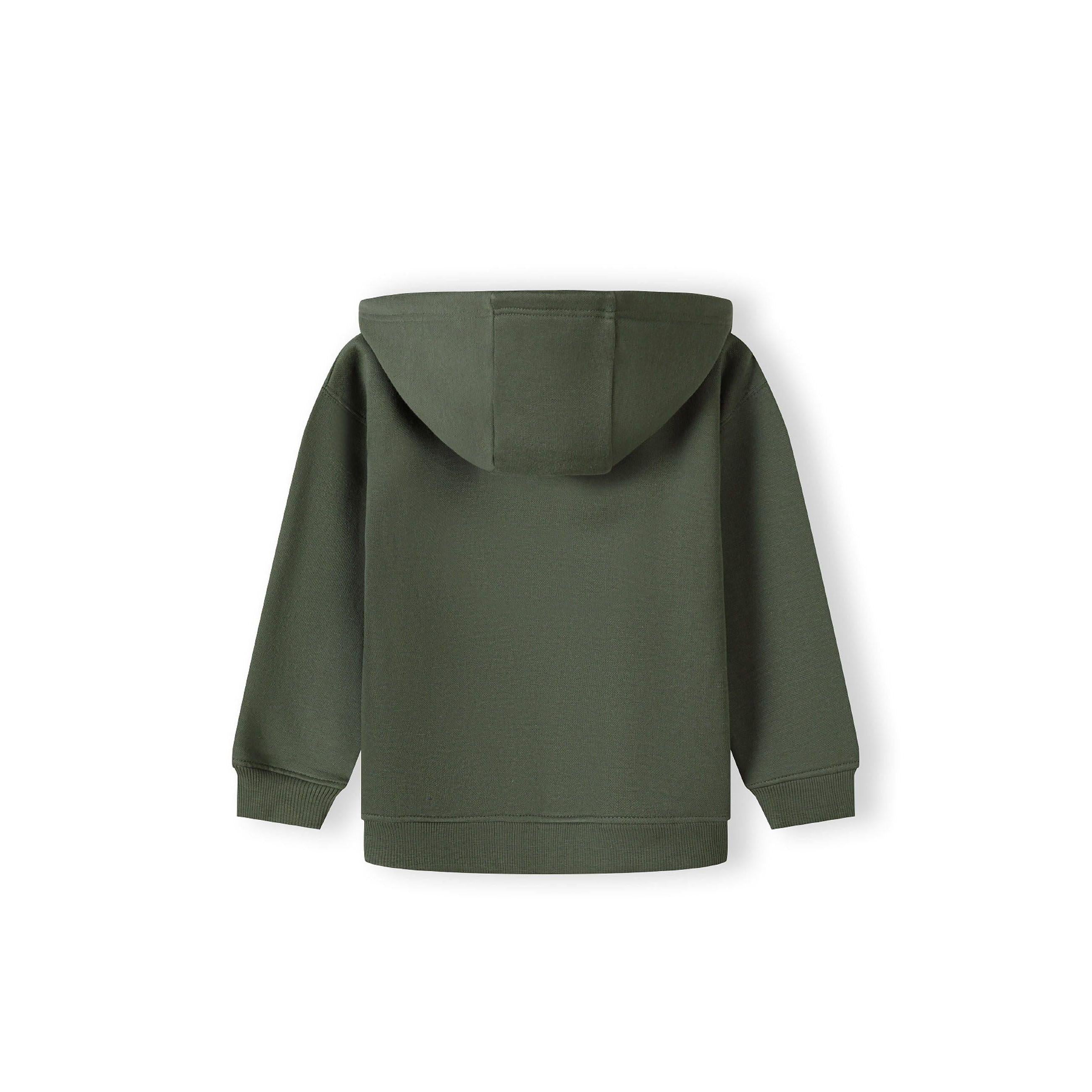 Close-up detail of khaki jogger pants showing drawstring waistband and Future Skate vertical text print on side seam