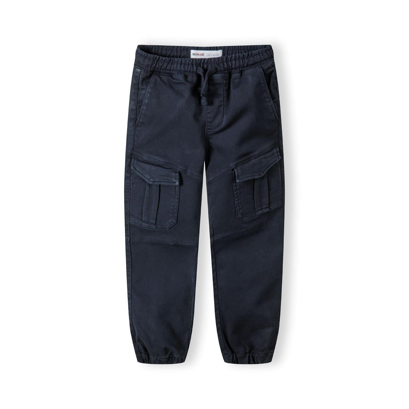 Front view of navy knitted cargo trousers showing elastic drawcord waistband, two large cargo pockets on legs, and tapered fit with elasticated cuffs on white background