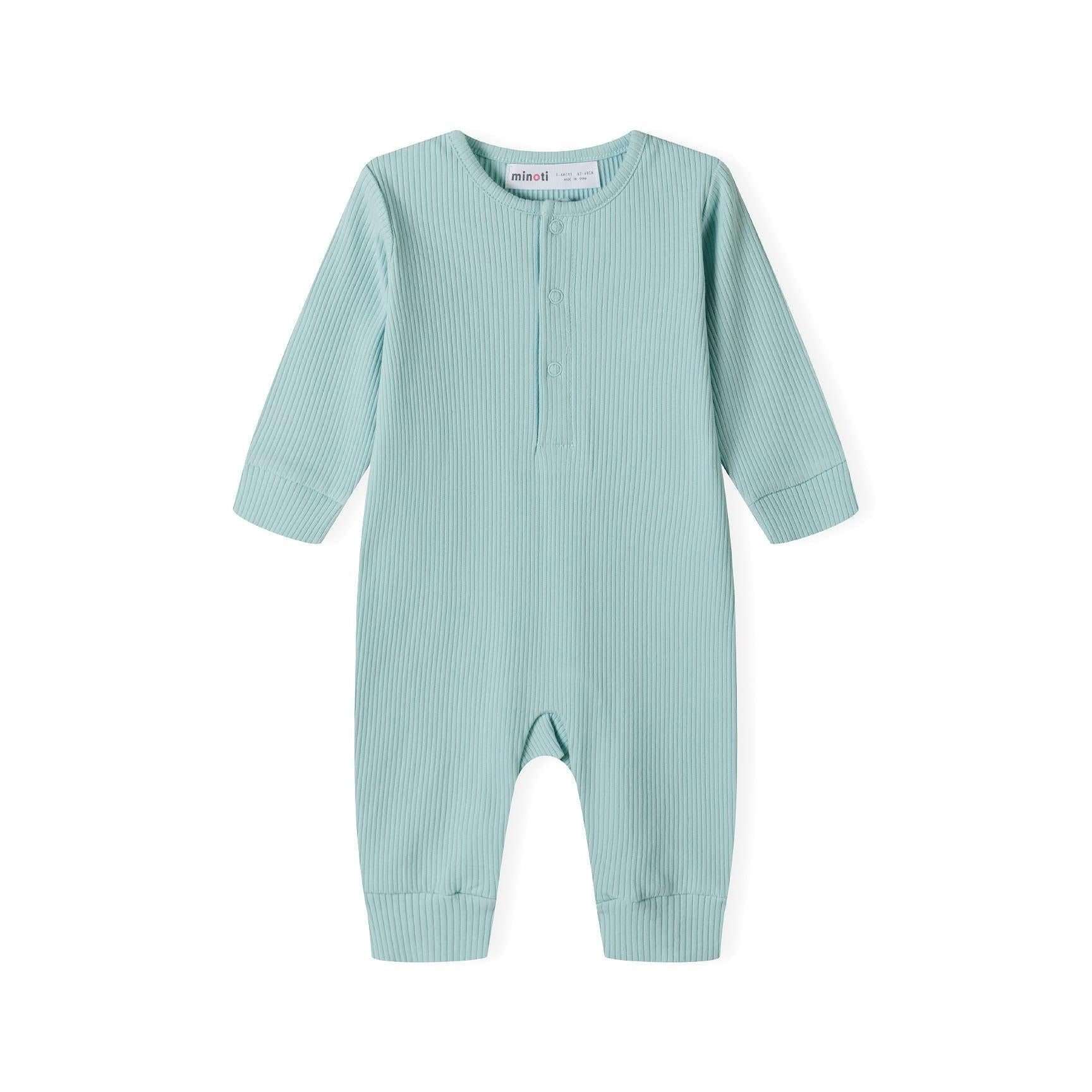 Close-up detail of sage green ribbed romper displaying Minoti brand label and front snap button closure design
