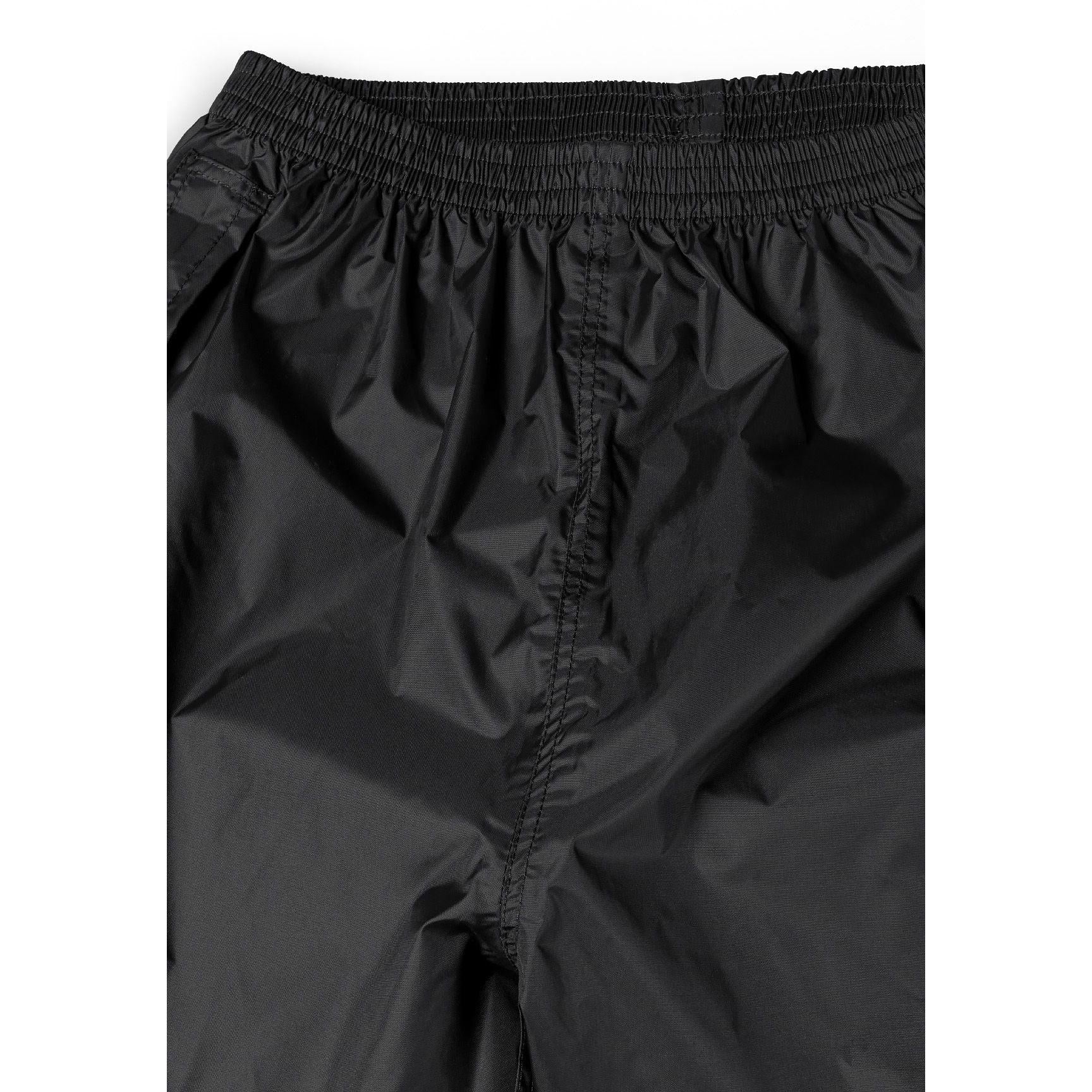 Close-up detail of black waterproof pants showing elastic waistband and taped seams