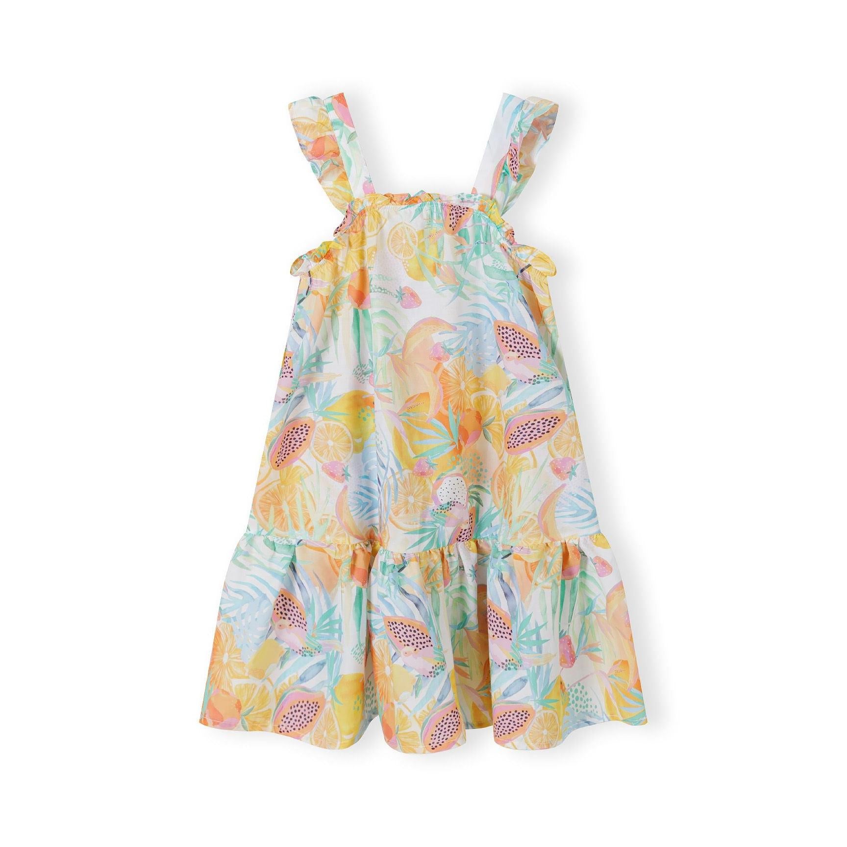 Flat lay of tropical print cotton dress showing tiered ruffle design with shoulder straps against white background