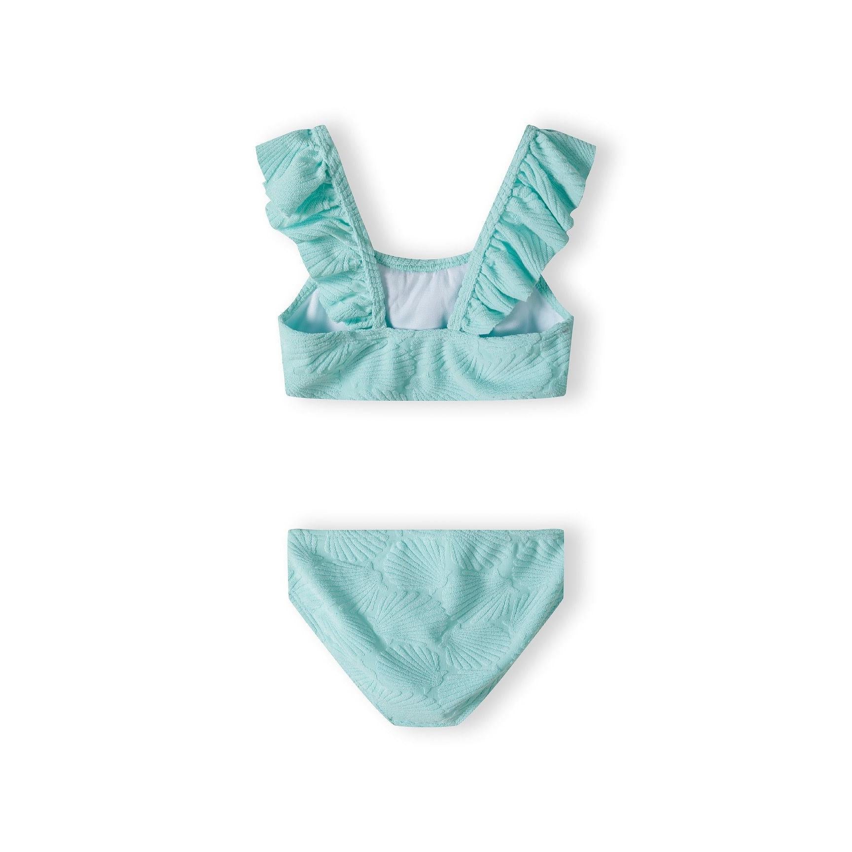 Back view of mint bikini top showing ruffle strap details and palm leaf textured fabric with white backing visible on shoulder straps