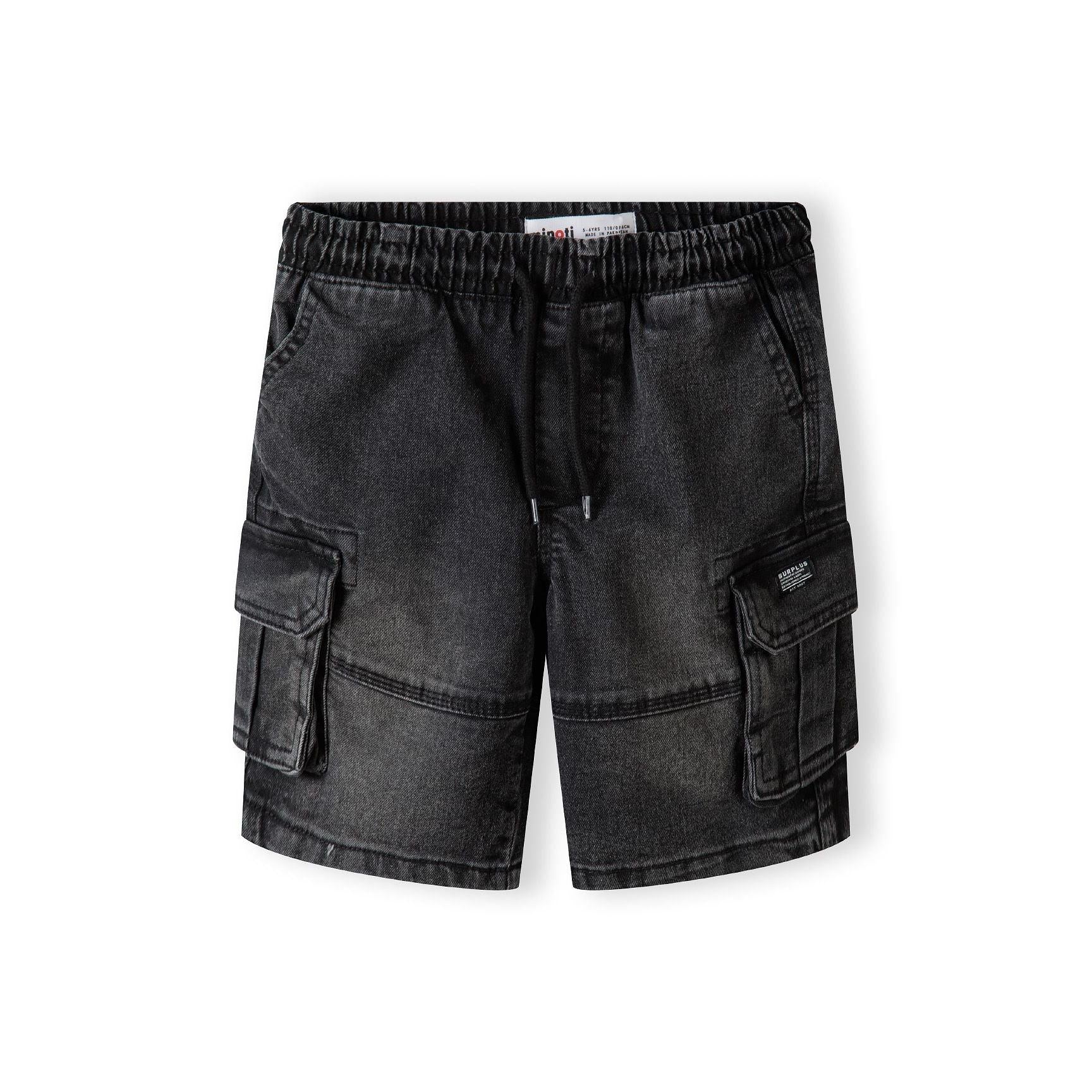 Back view of black denim cargo shorts showing elasticated waistband with drawcord and multiple cargo pockets on white background