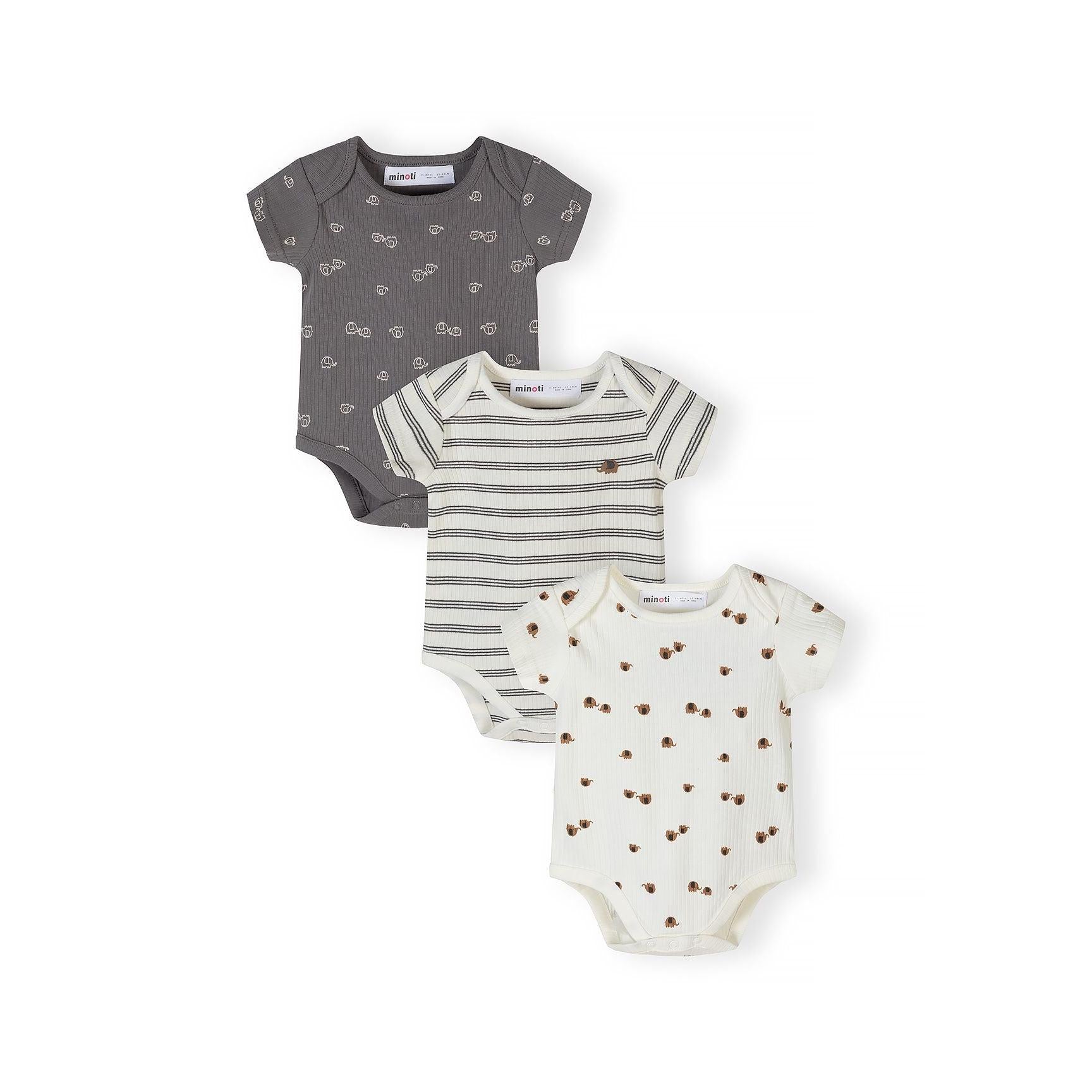 Three ribbed baby bodysuits laid flat - grey with white elephant prints, white with navy stripes, and cream with brown polka dots, showing coordinated neutral designs