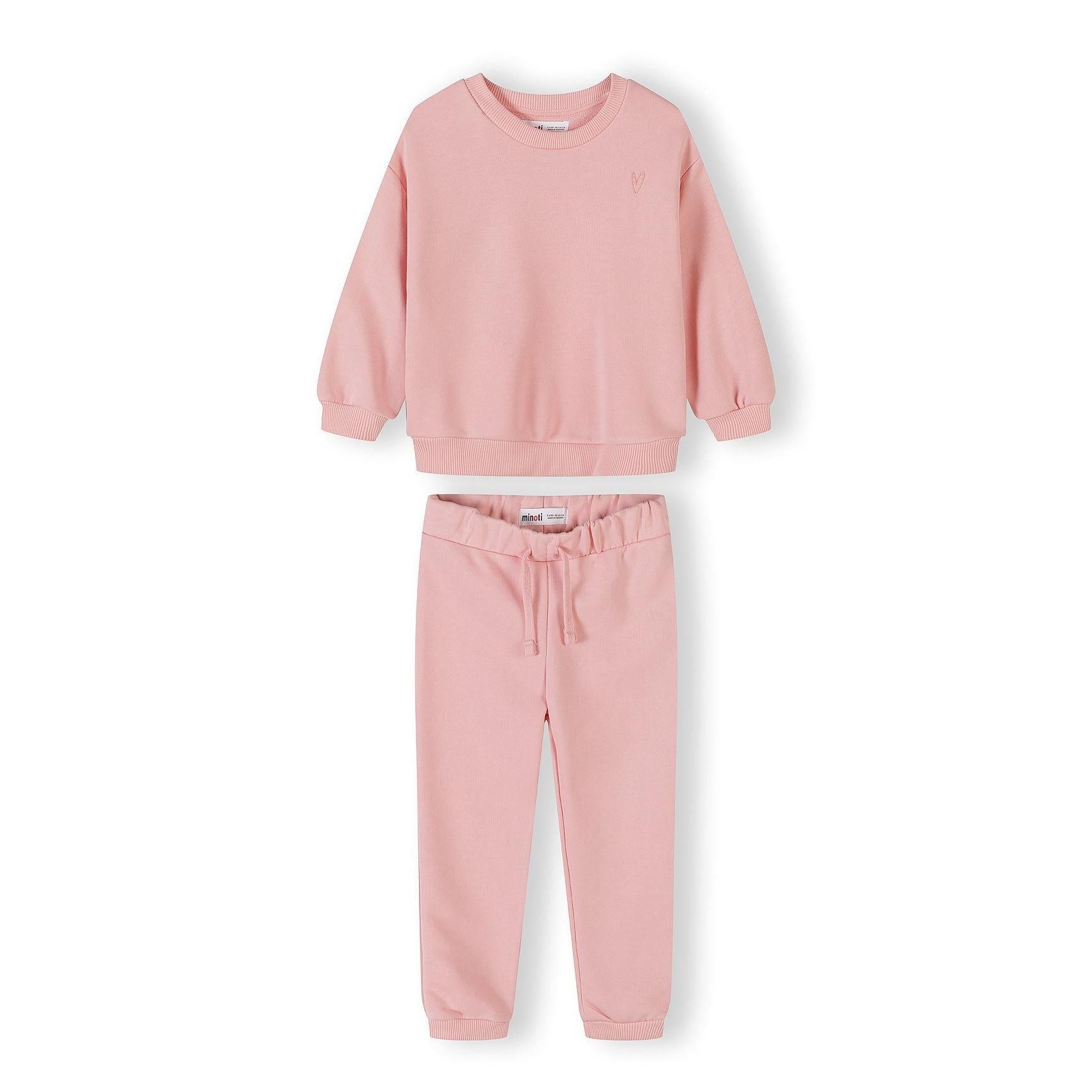 Grey tracksuit set with sweatshirt and joggers displayed on white background showing ribbed details