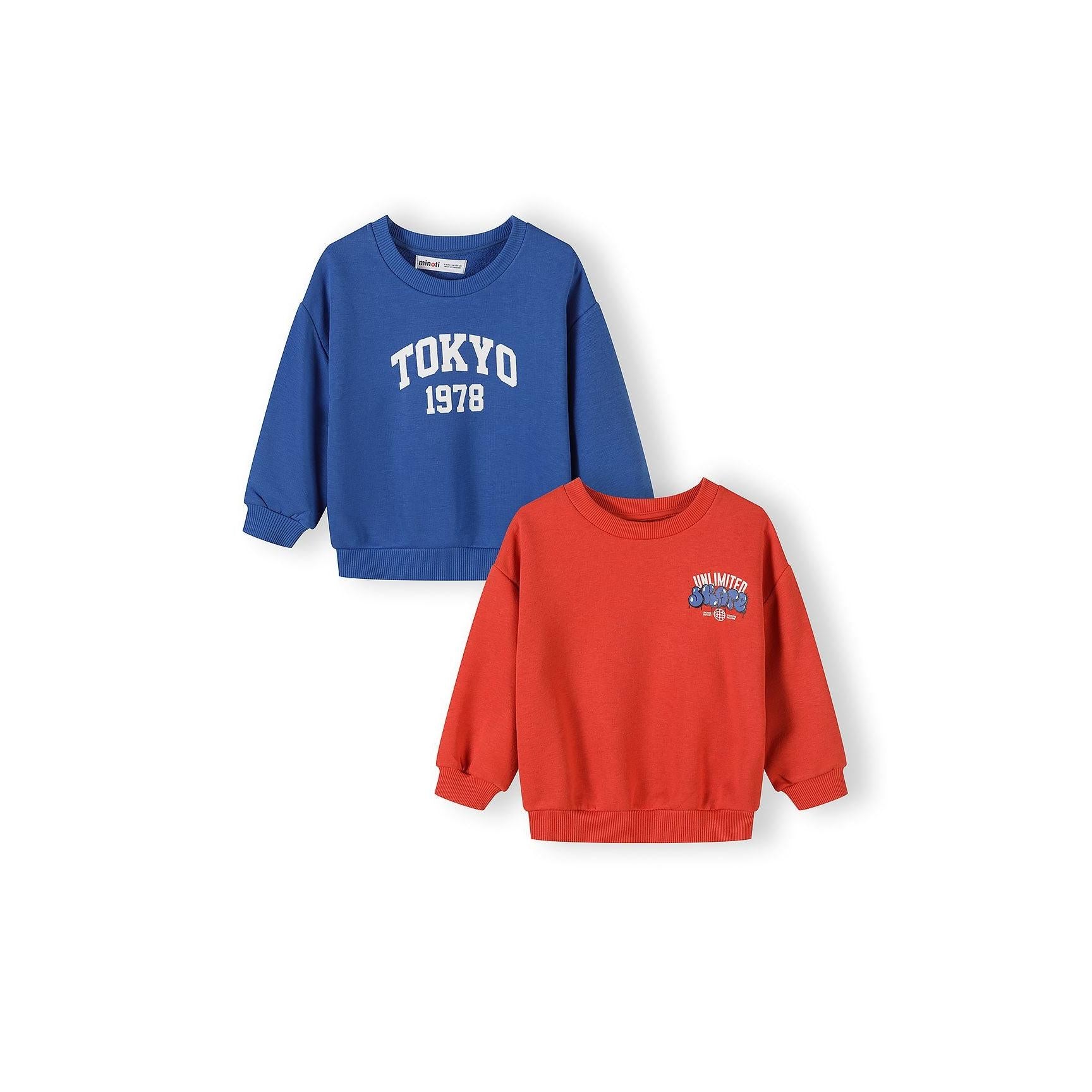 Two children's sweatshirts displayed on white background - blue sweatshirt with Tokyo 1978 white collegiate print positioned above red sweatshirt with unlimited power graphic on chest