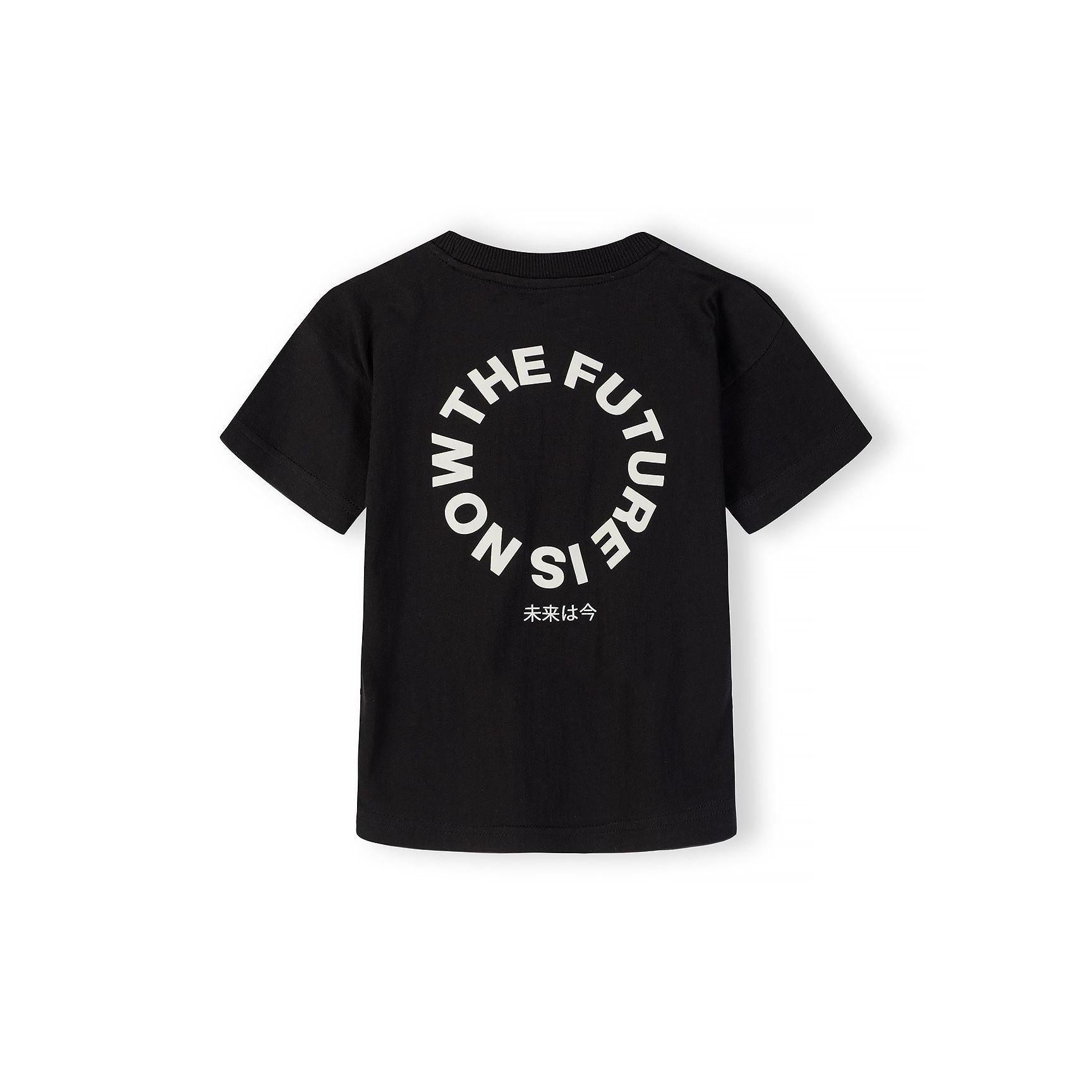 Back view of black t-shirt showing The Future is Now circular print design with Japanese characters underneath on white background