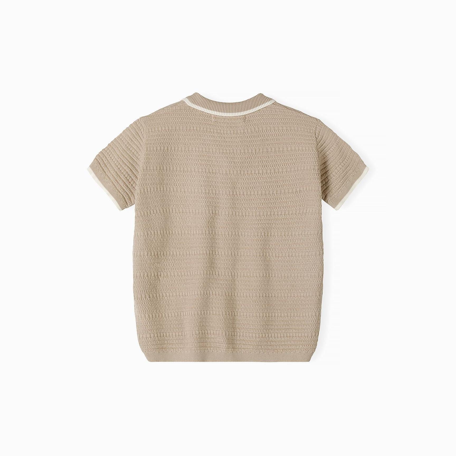 Back view of beige knitted polo shirt showing textured herringbone pattern and ribbed collar detail on white background