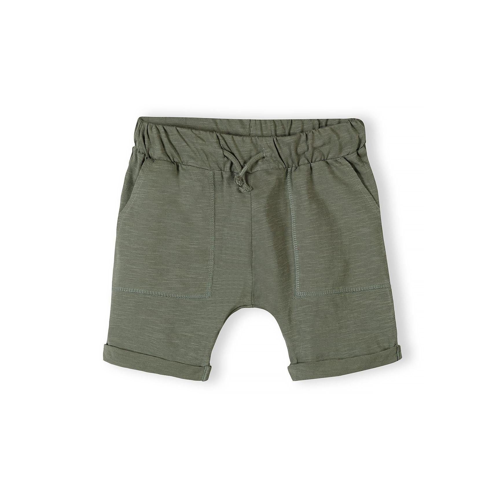 Single navy blue cotton jersey shorts with drawstring waist and rolled hem cuffs shown against white background