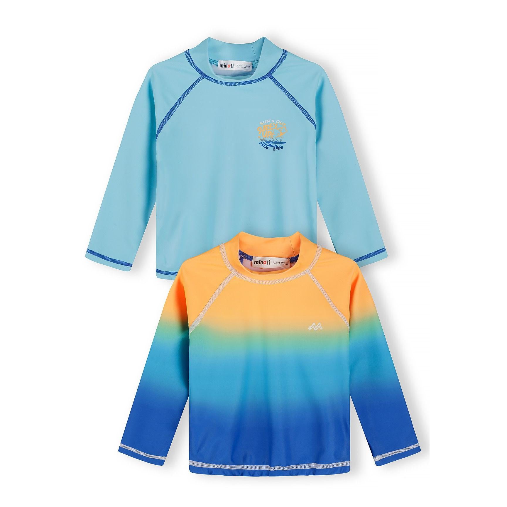 Close-up detail of solid light blue swim t-shirt showing chest print with text and wave design, blue contrast stitching visible around neckline