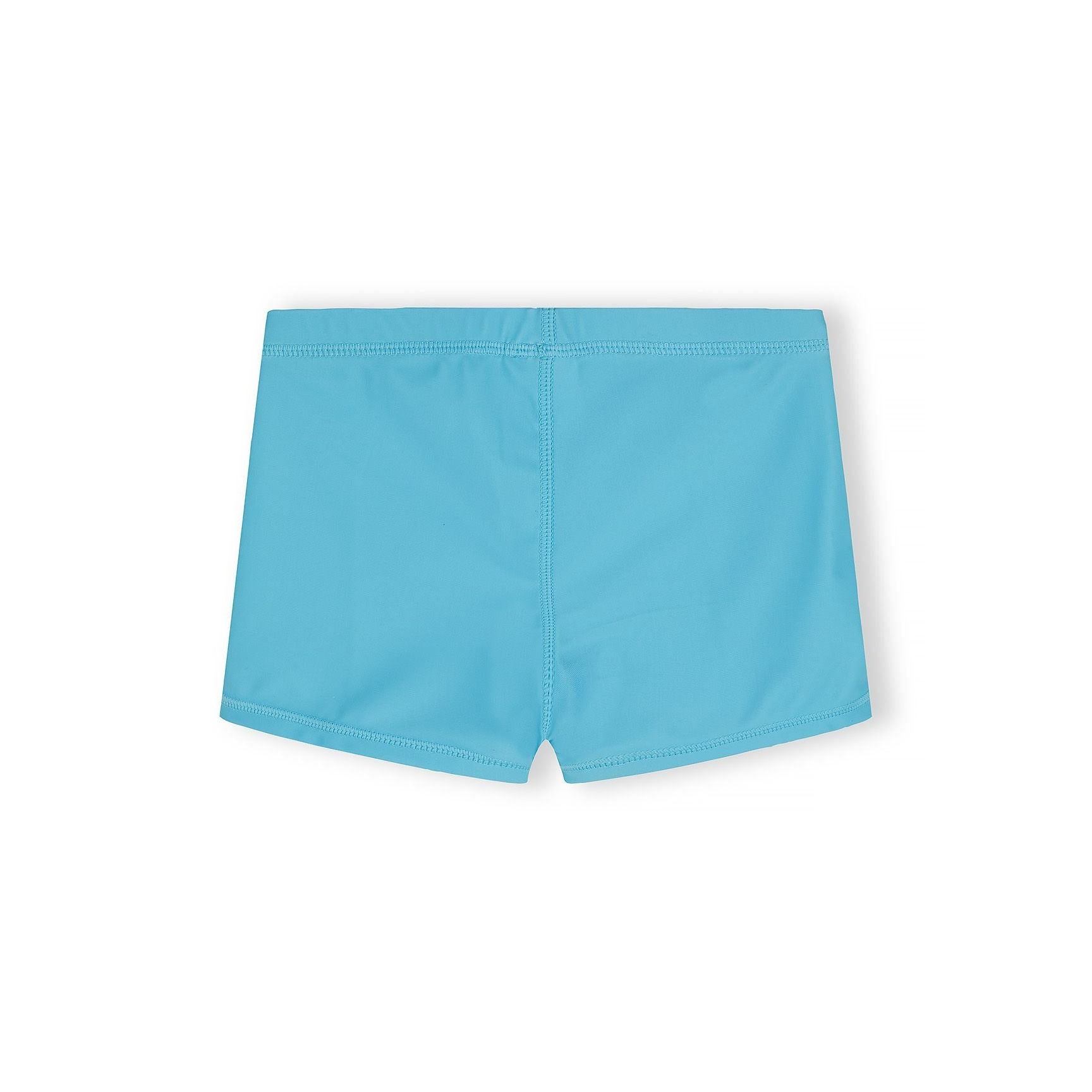 Close-up detail view of turquoise swim shorts showing fabric texture, stitching quality and embroidered brand logo placement