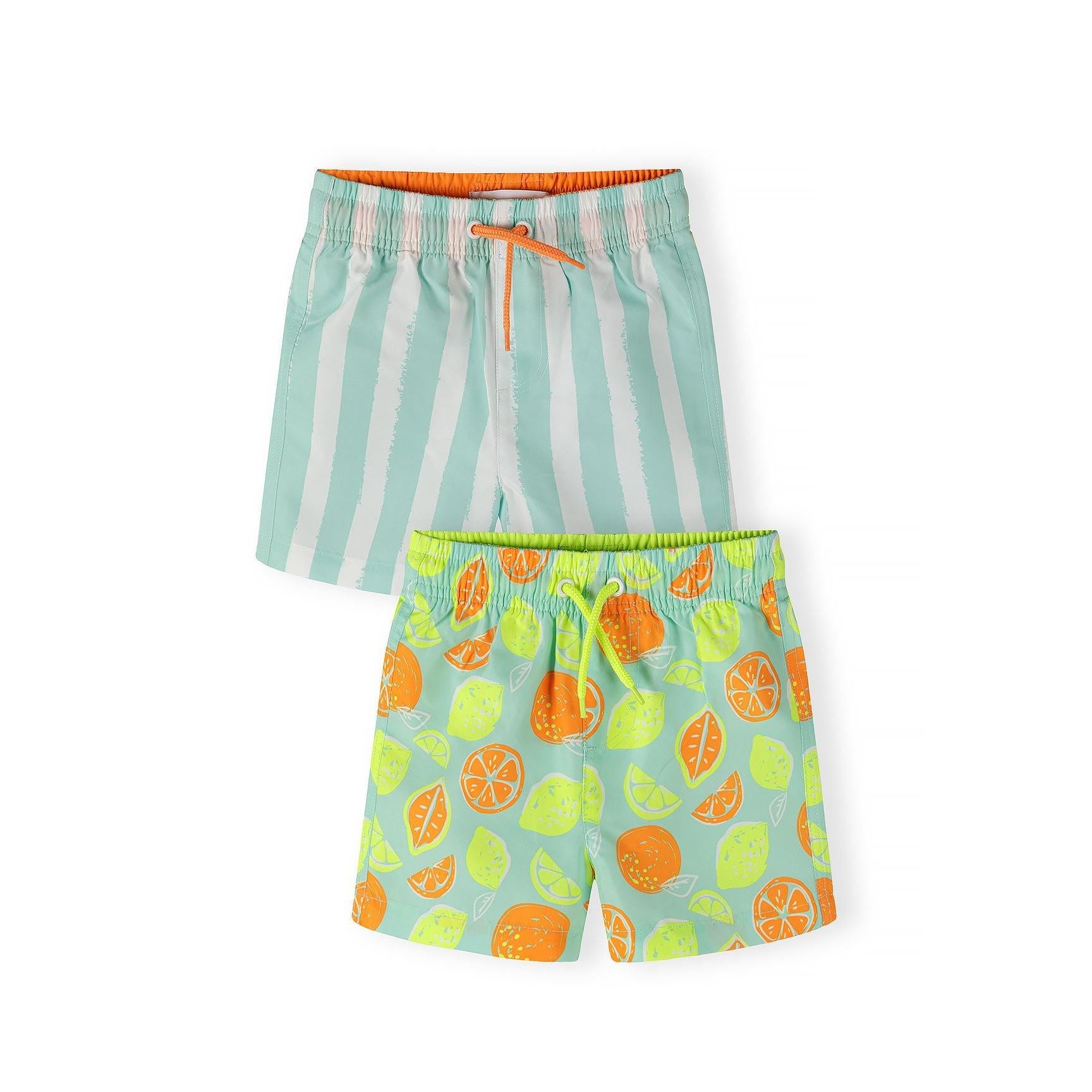 Two pairs of swim shorts displayed on white background - mint green striped shorts with orange waistband trim on top, aqua blue shorts with colorful citrus fruit print below