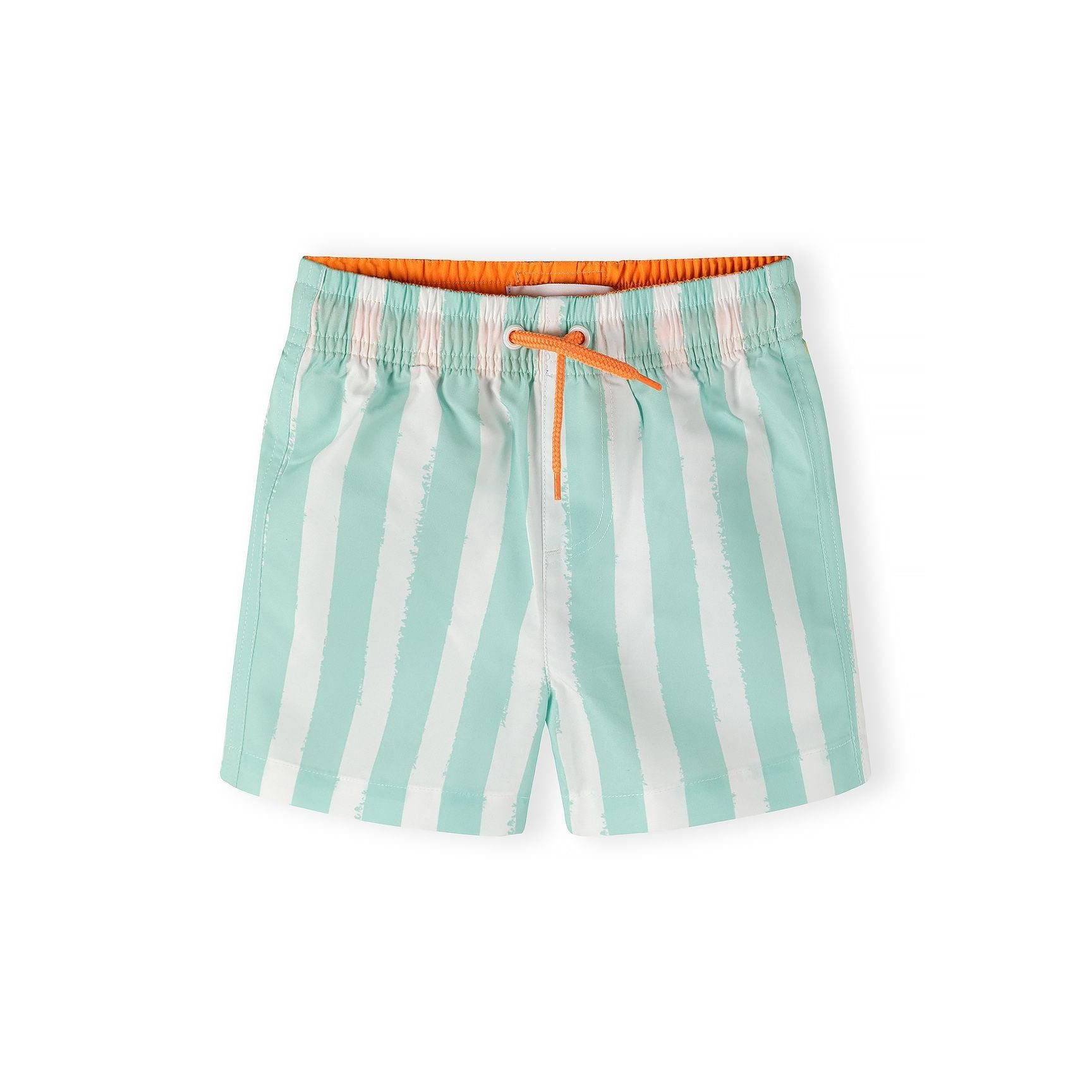 Close-up of mint green striped swim shorts with white stripes, showing elastic waistband with orange trim and drawstring detail on white background