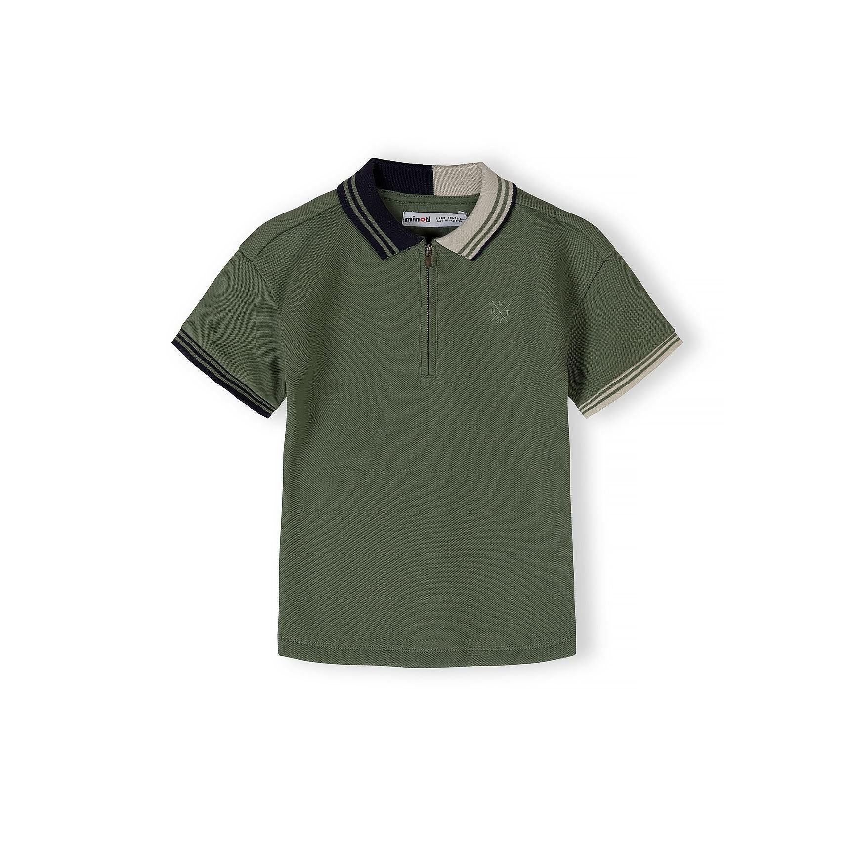 Flat lay of teal pique polo shirt with contrast collar trim and half-zip closure on white background