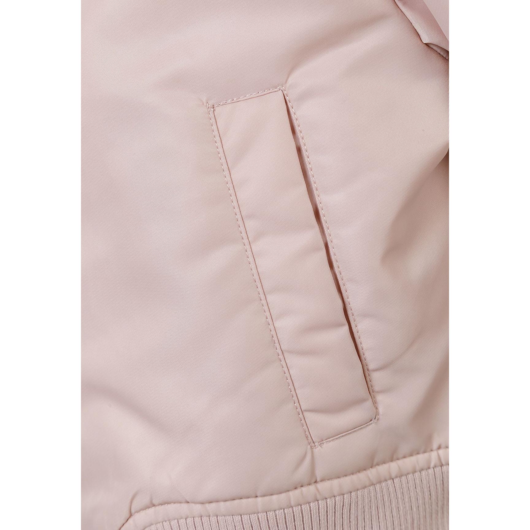 Close-up detail of pink quilted bomber jacket showing rectangular chest pocket with stitched edges and quilted nylon fabric texture