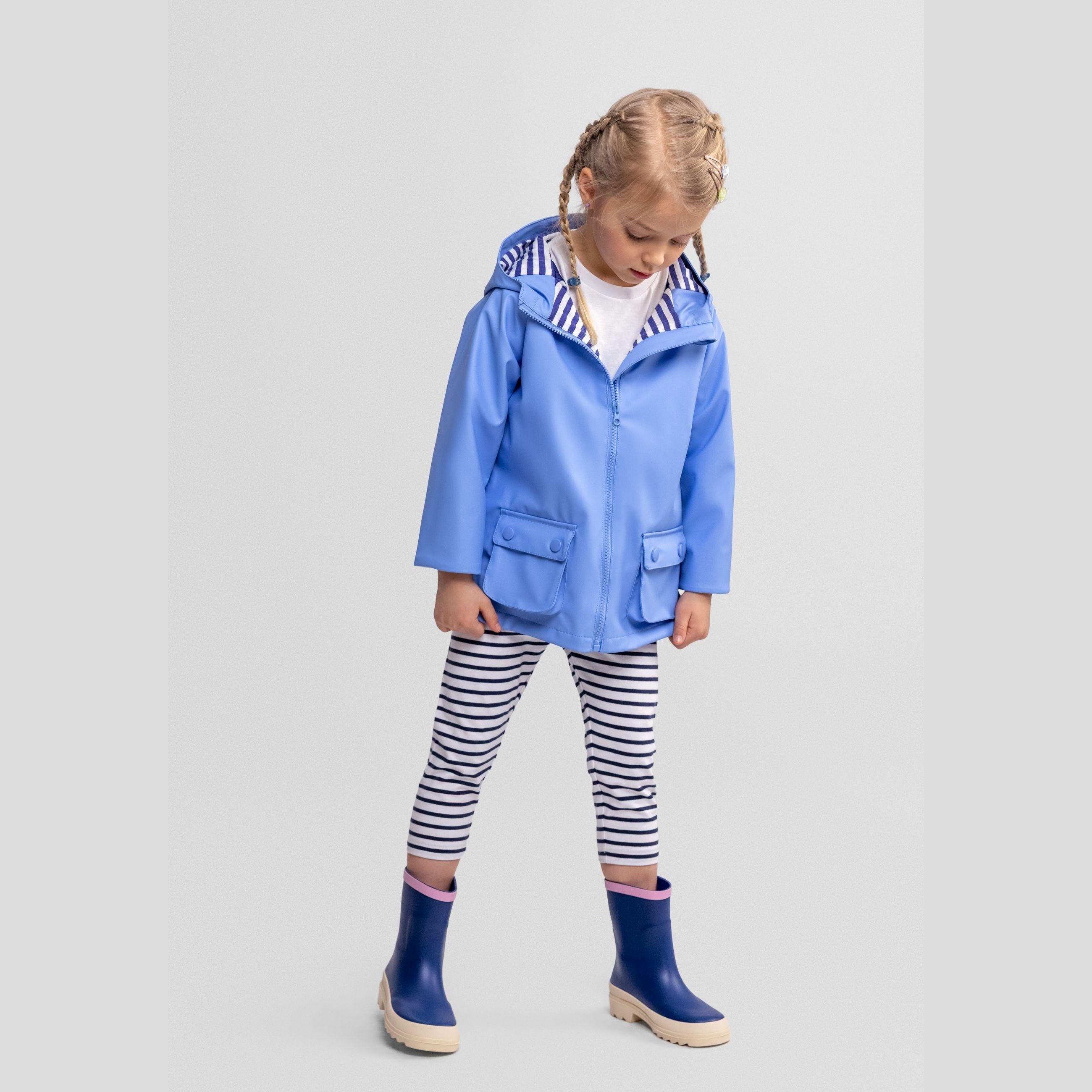Blue rain jacket with fixed hood laid flat showing front view with zip closure, two button pockets and striped hood lining on white background