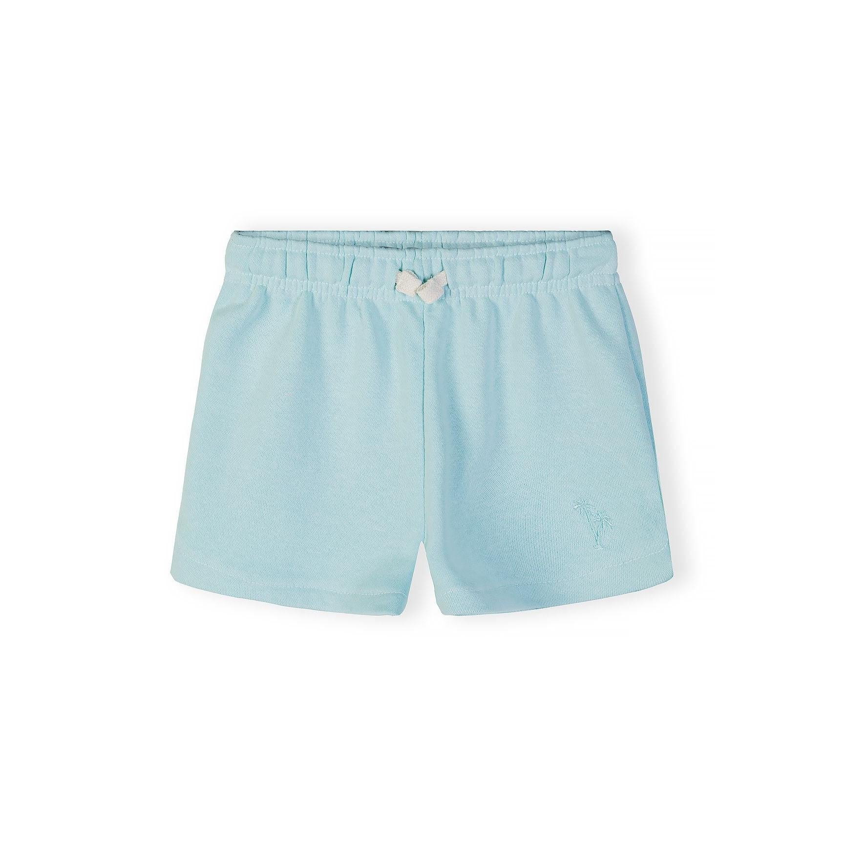 Close-up of mint green shorts showing embroidered palm tree detail and white bow tie at elasticated waistband