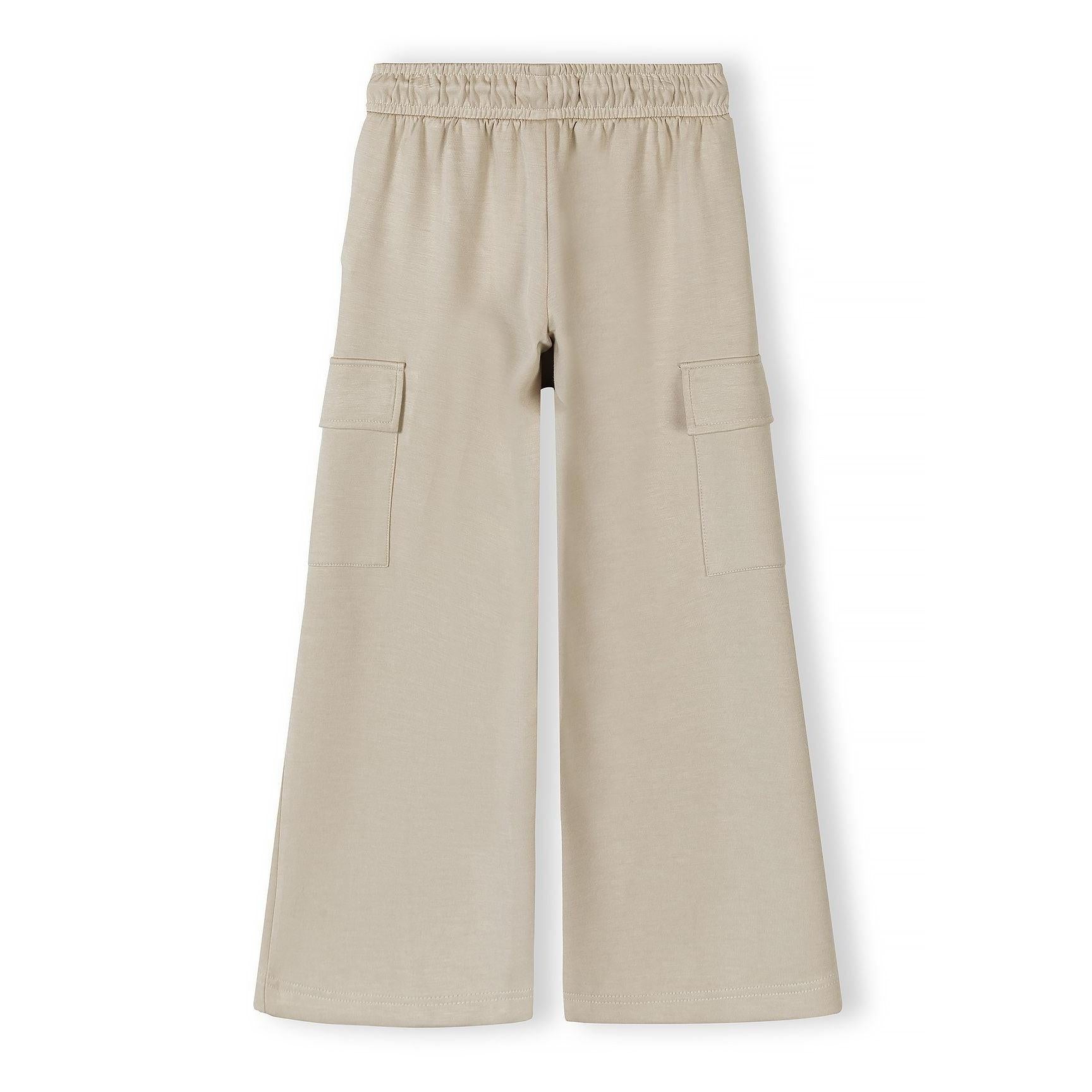 Beige wide leg joggers with cargo pockets flat lay on white background back view