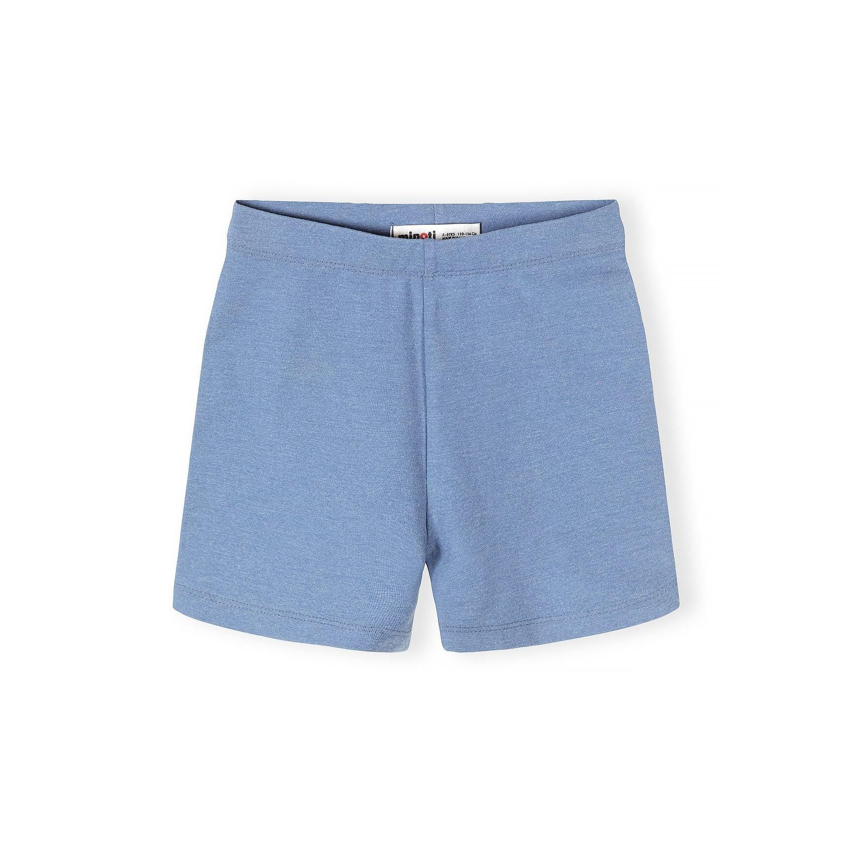 Close-up detail of blue cycling shorts showing fabric texture, stitching quality and Minoti label with brand name clearly visible