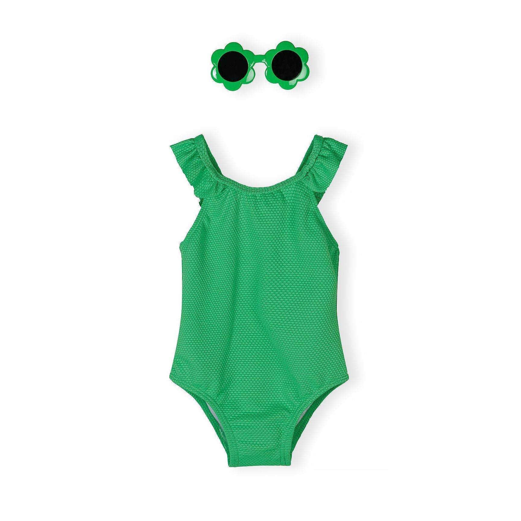 Neon green one-piece swimsuit with adjustable ruffle straps and matching flower-shaped sunglasses on white background