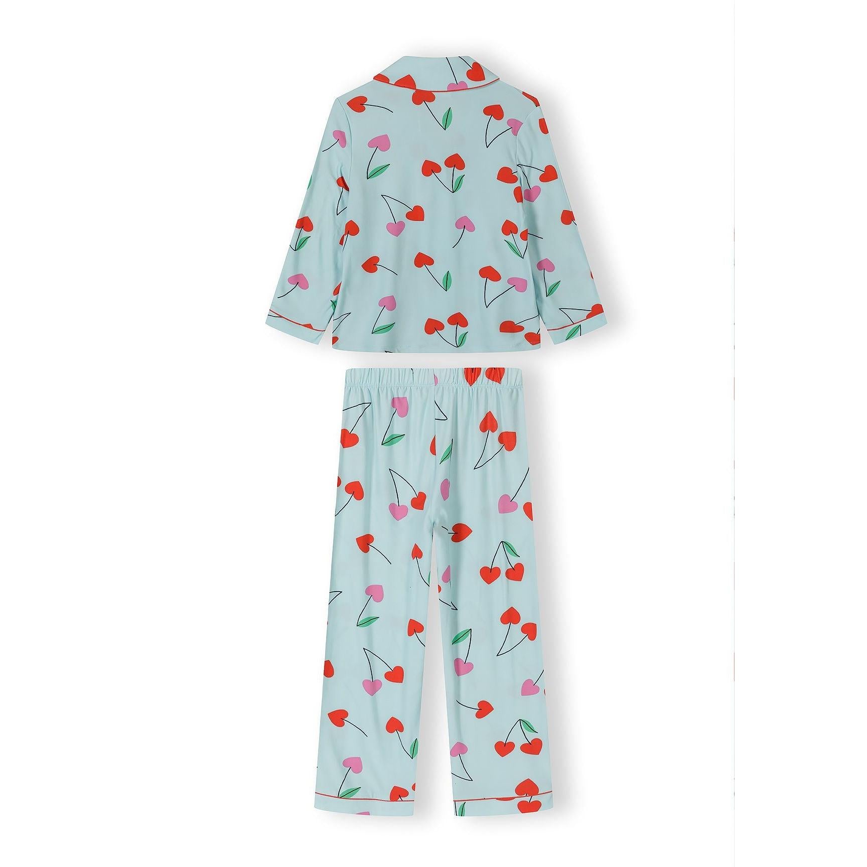 Close-up of light blue cherry print pajama top with button-through front, notched collar and chest pocket on white background