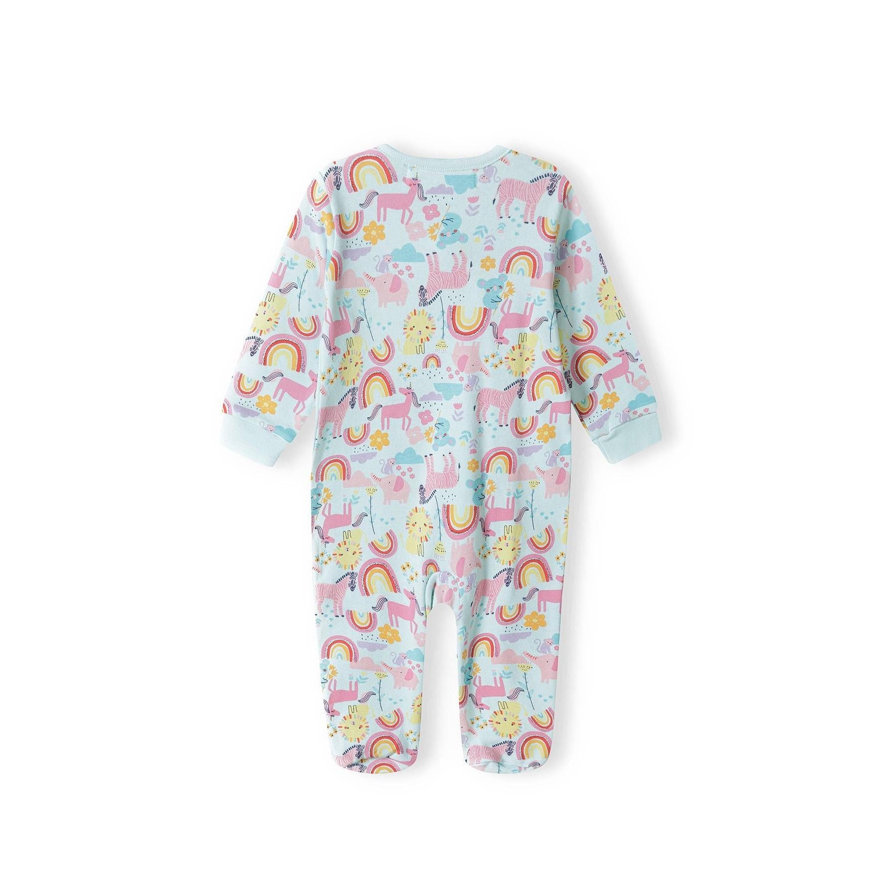 Back view of unicorn rainbow print baby sleepsuit displaying colorful pattern with unicorns, rainbows, stars and clouds on light blue background with enclosed feet