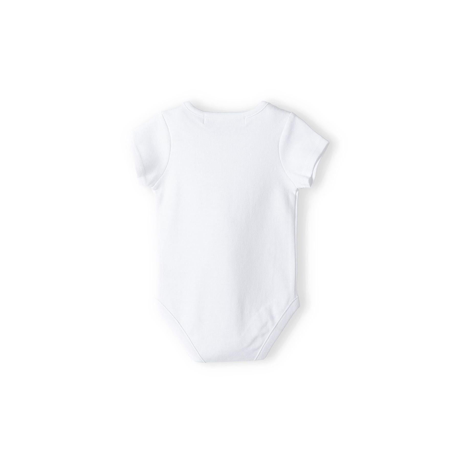 Close-up detail of white cotton bodysuit showing soft fabric texture and Minoti brand label at neckline