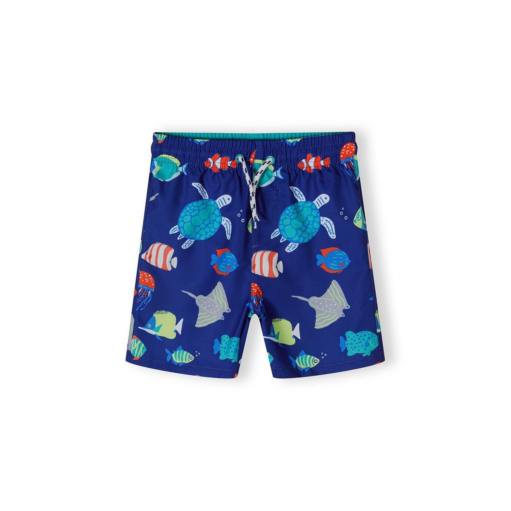 Navy board shorts with colourful sea life print featuring turtles, clownfish, jellyfish and tropical fish, displayed flat against white background