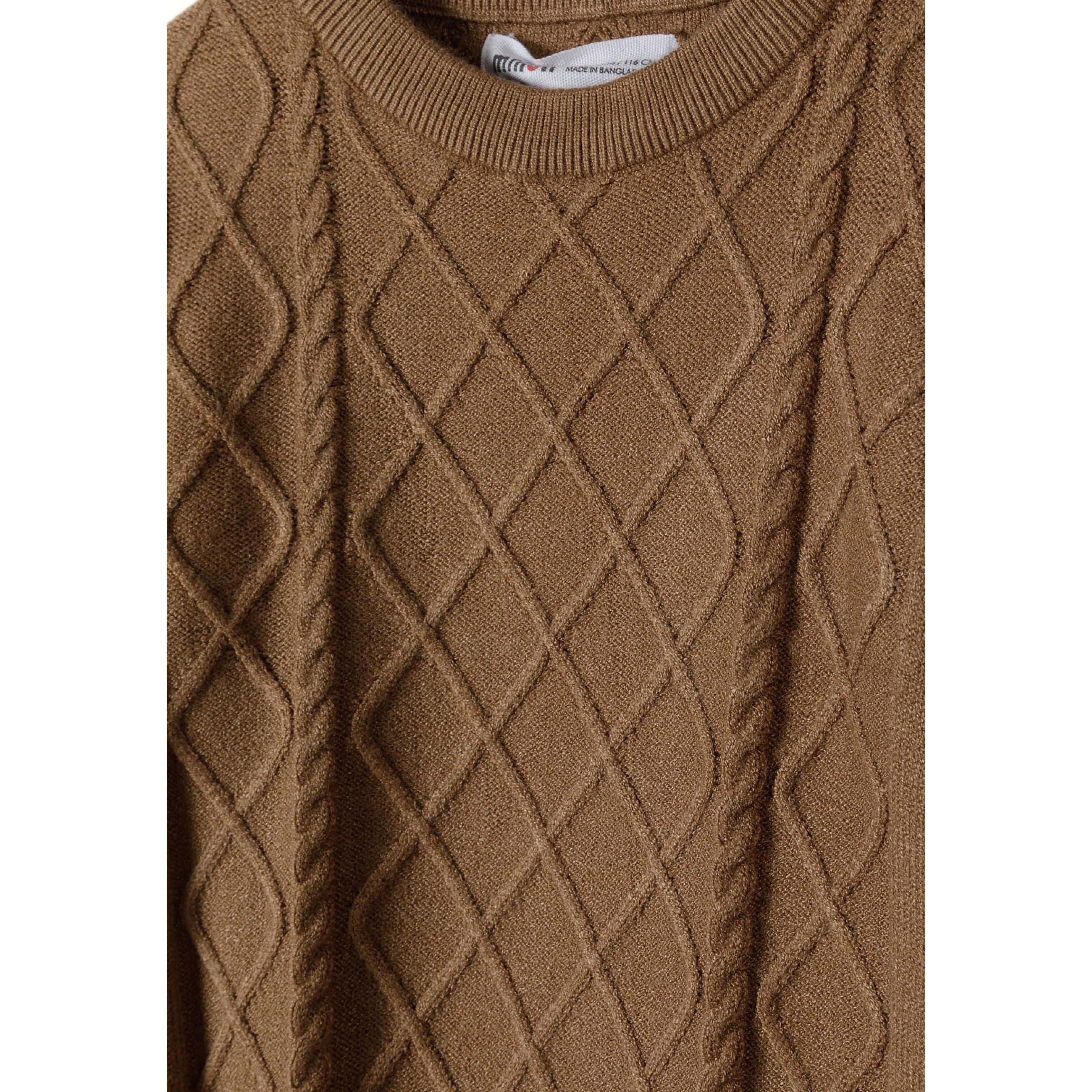 Close-up detail of brown cable knit jumper showing diamond textured pattern and Minoti label at crew neck collar