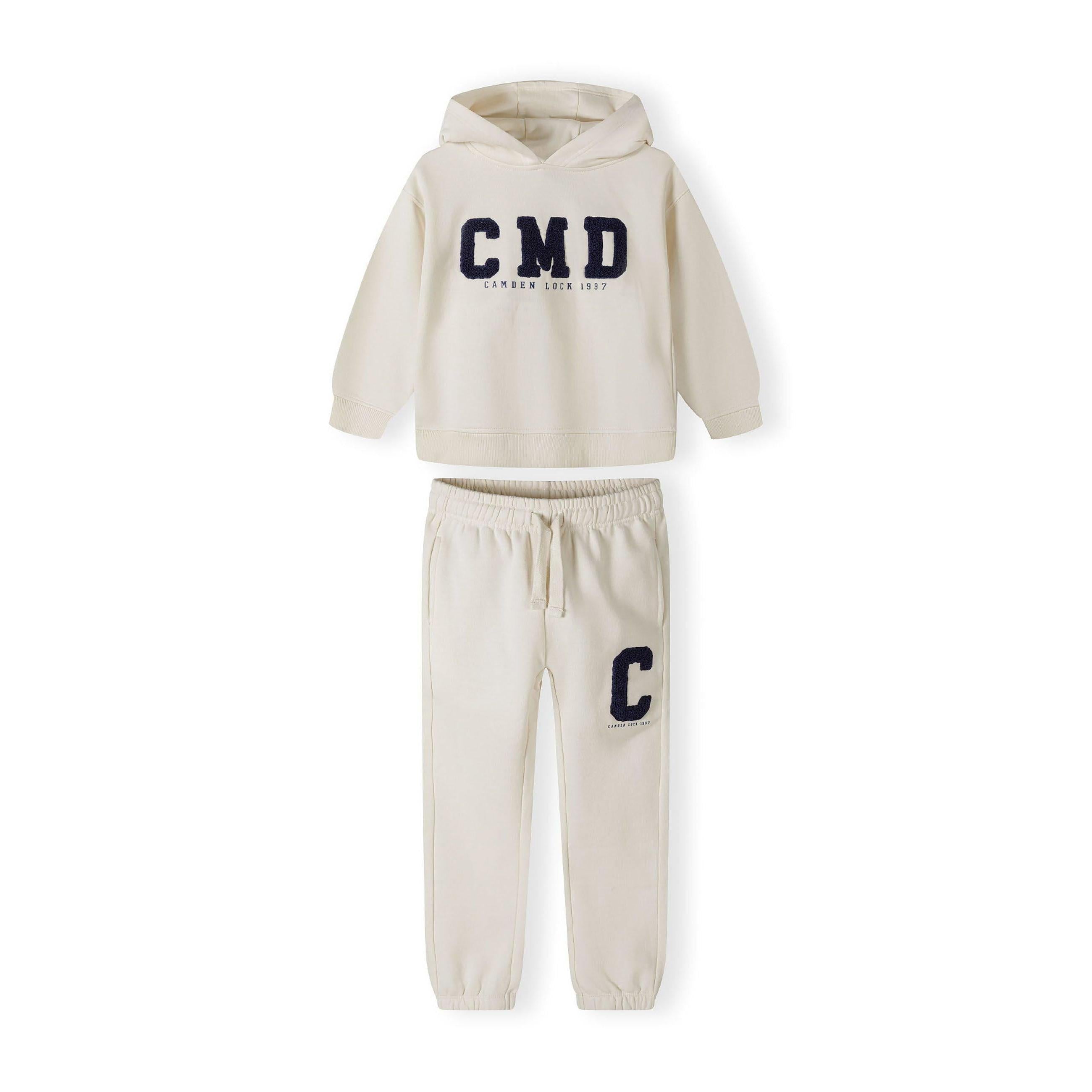 Back view of cream hoodie showing plain design with hood detail on white background