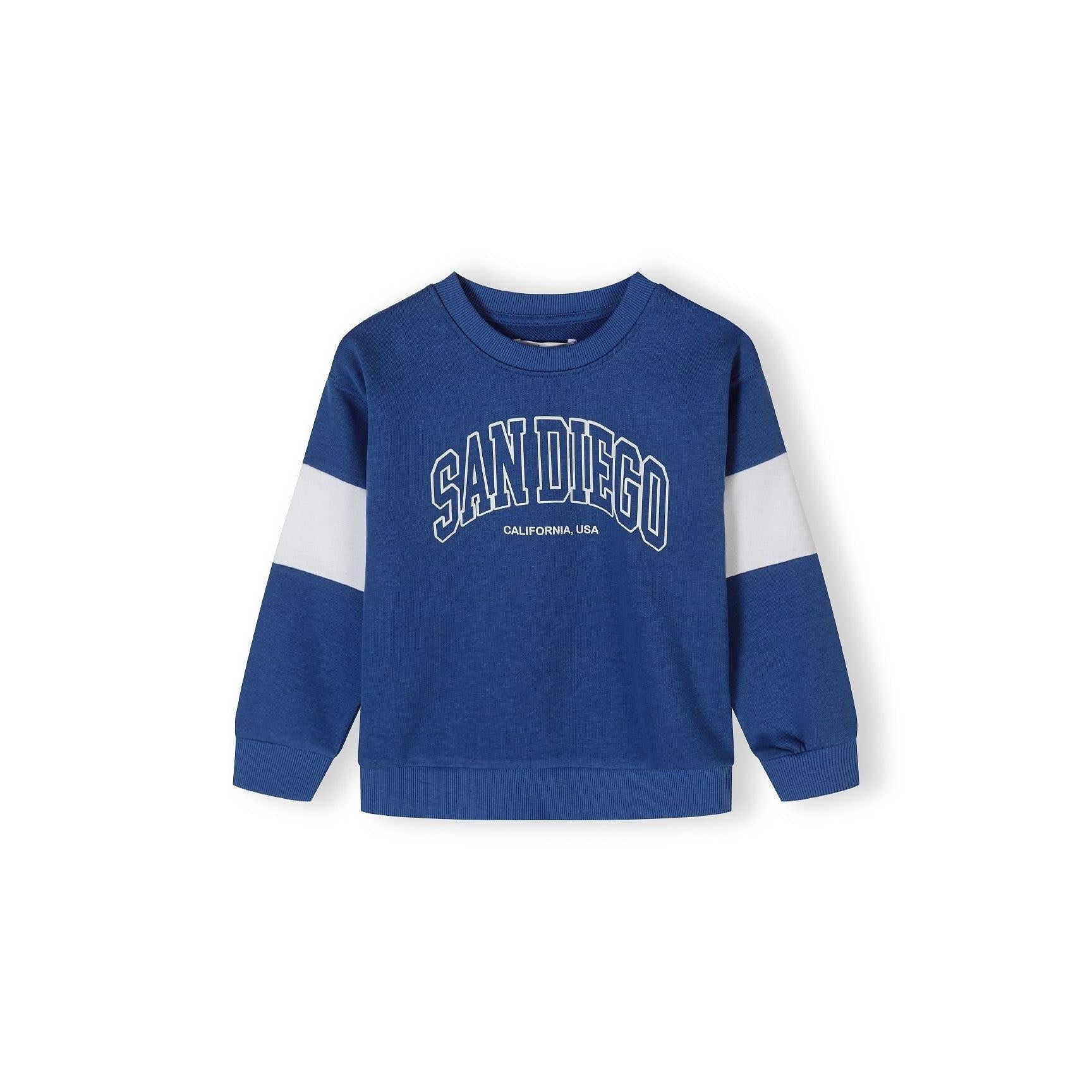 Close-up detail of cobalt blue joggers waistband showing elasticated drawstring waist with matching blue cord and soft fleece texture