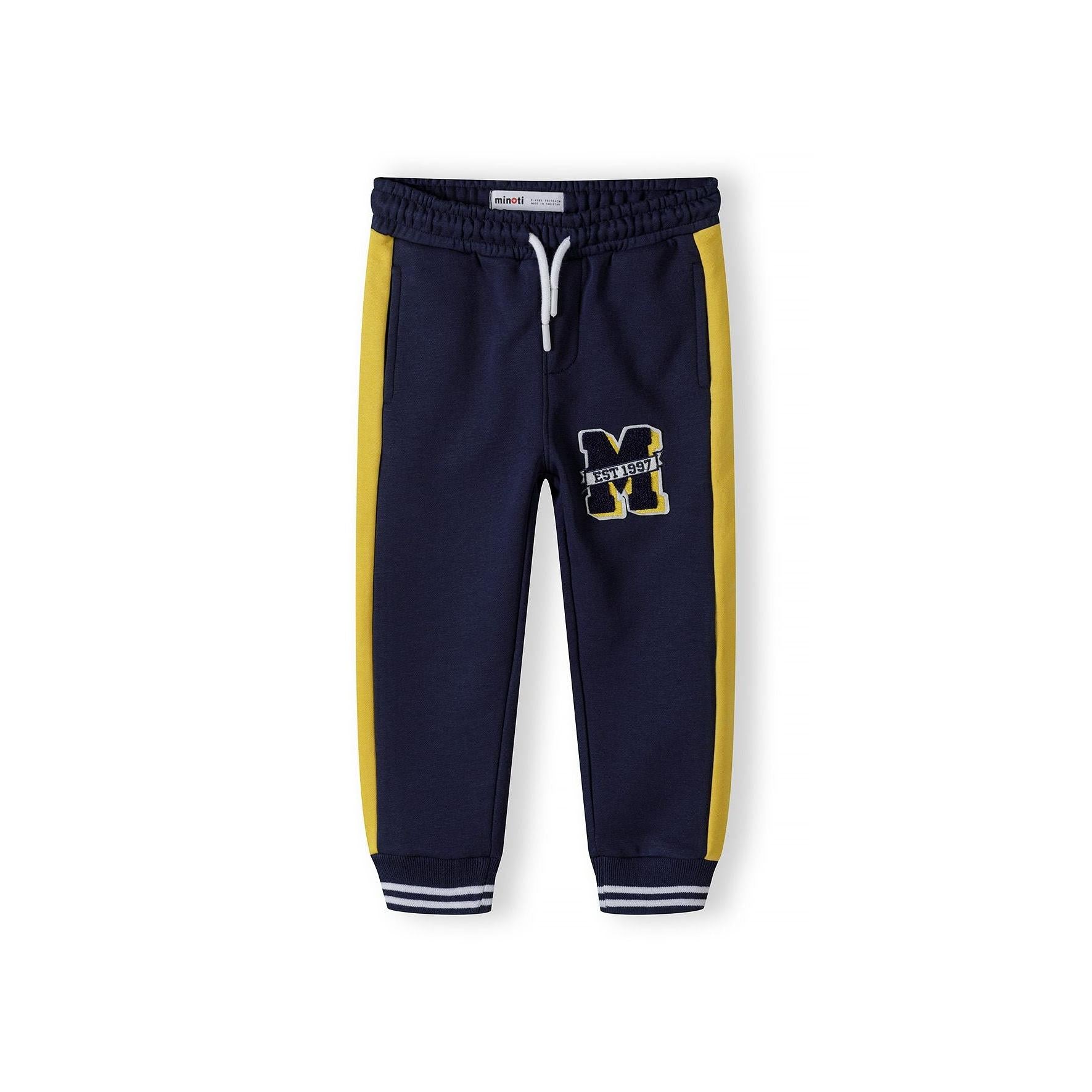 Back view of navy fleece sweatpants with yellow side stripe panels, showing elastic waistband and back pocket with white label tag