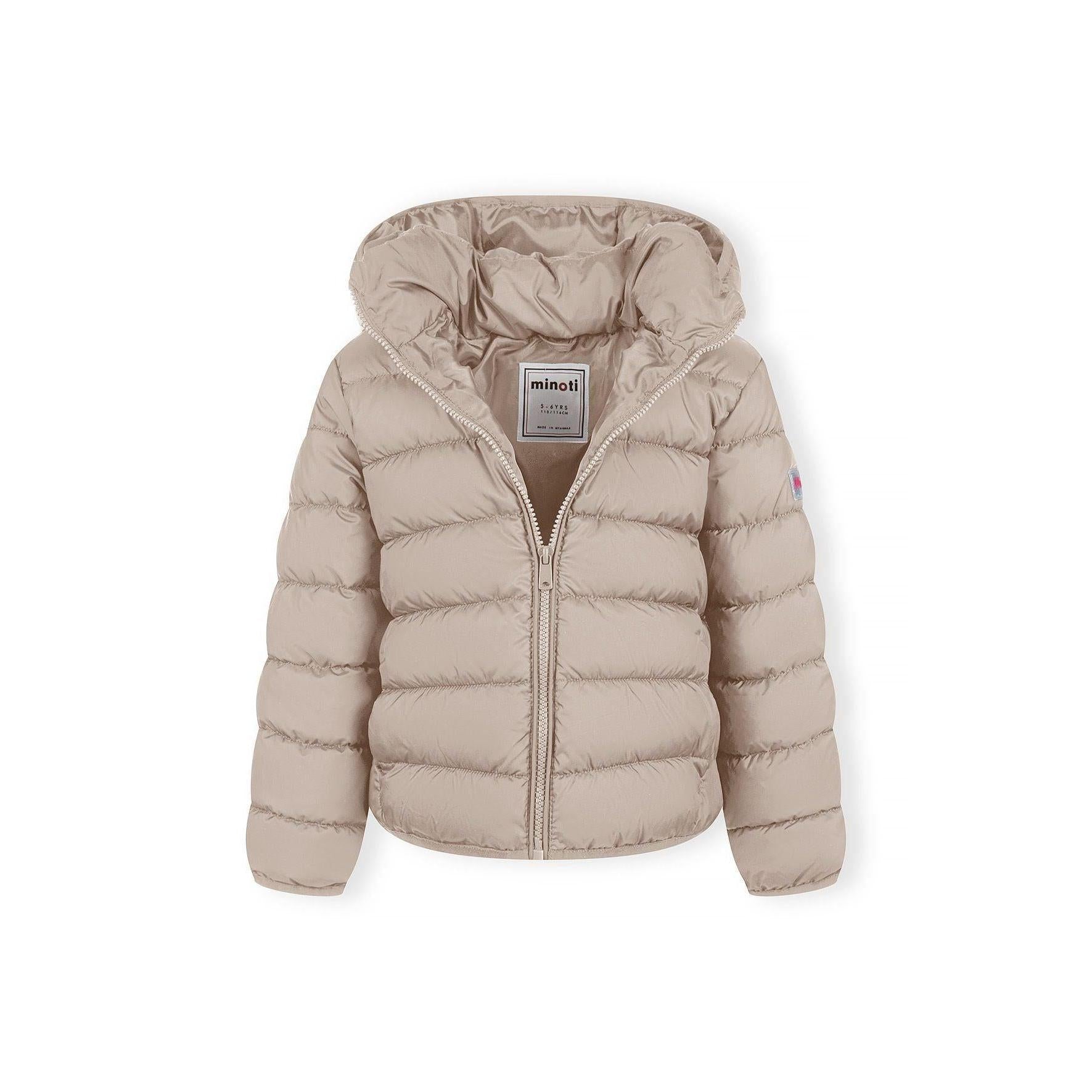 Detailed view of beige quilted jacket construction showing padded panels, zip mechanism and hood design elements, soft neutral lighting