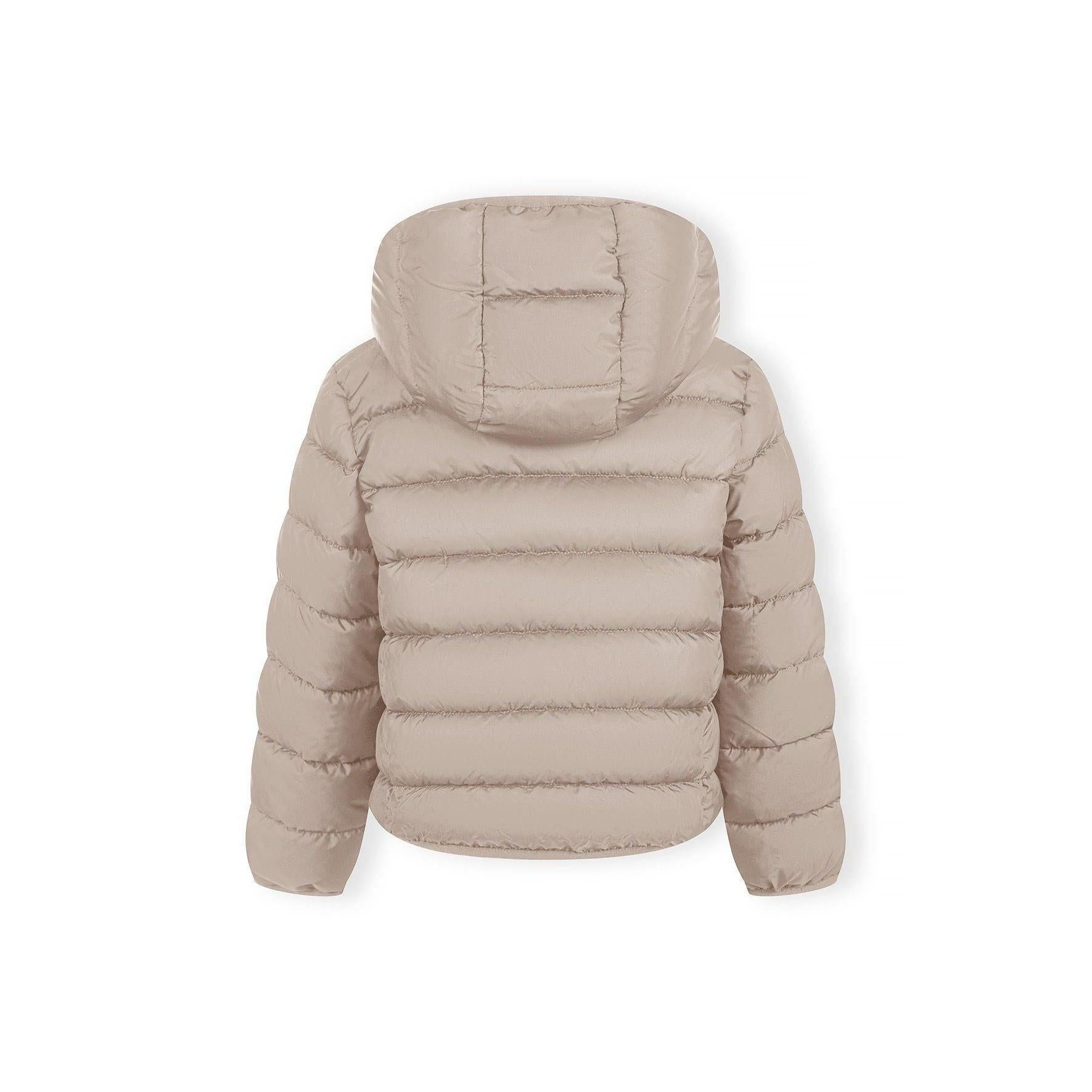 Detailed view of beige quilted jacket construction showing padded panels, zip mechanism and hood design elements, soft neutral lighting