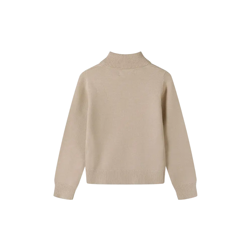 Beige turtleneck jumper laid flat against black background, showing front view with ribbed collar and cuffs detail