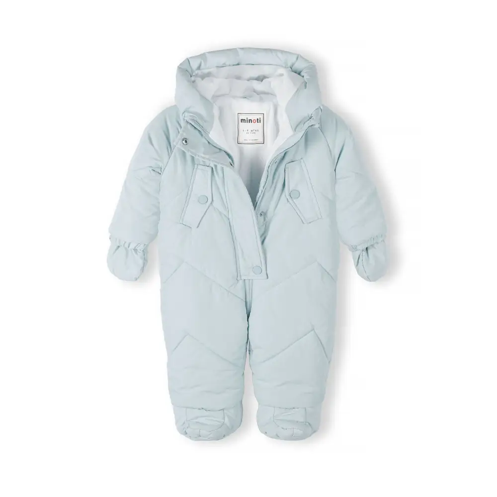 Close-up detail of light blue snowsuit showing integrated padded mitten with quilted texture and seam construction
