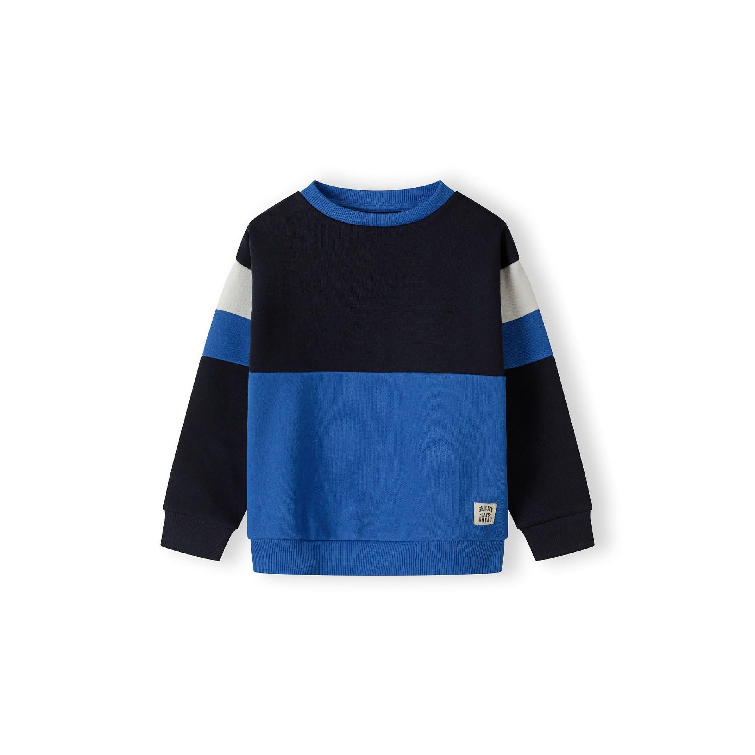 Close-up detail of navy jogger waistband with blue drawstring ties and side panel construction