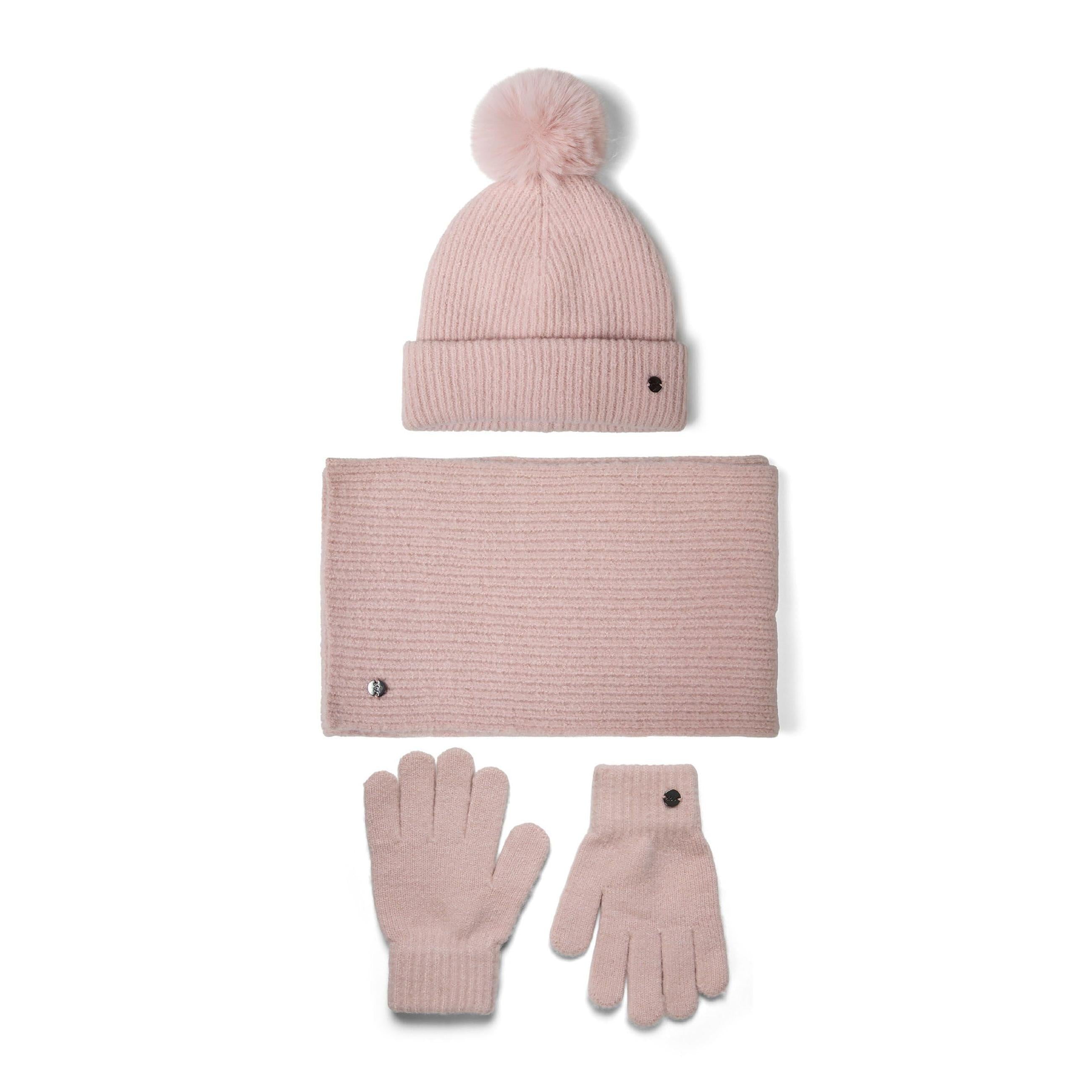 Pair of pale pink ribbed knit gloves with small dark button detail on white background